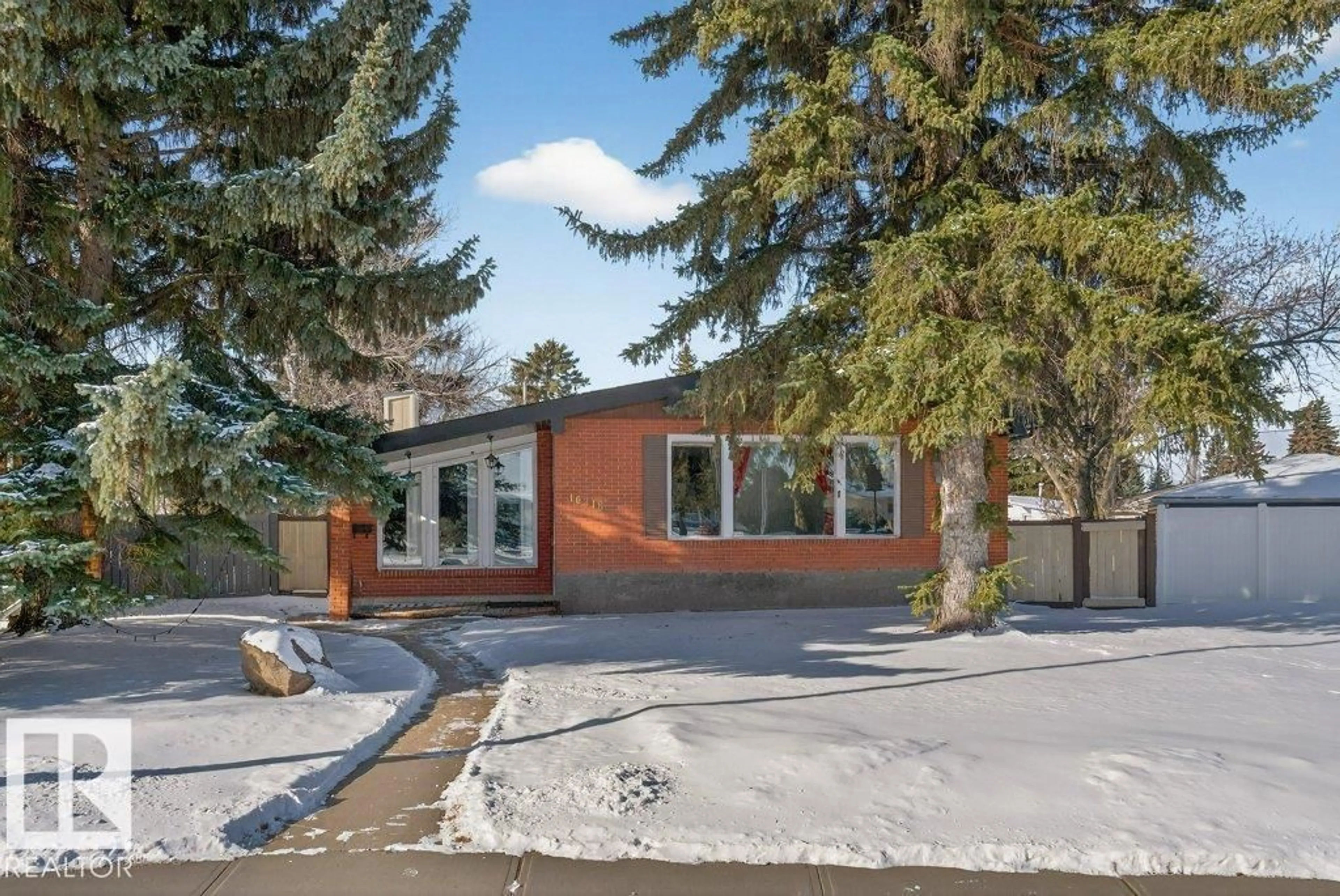 Home with brick exterior material, street for 10316 42 ST E NW, Edmonton Alberta T6A1T5