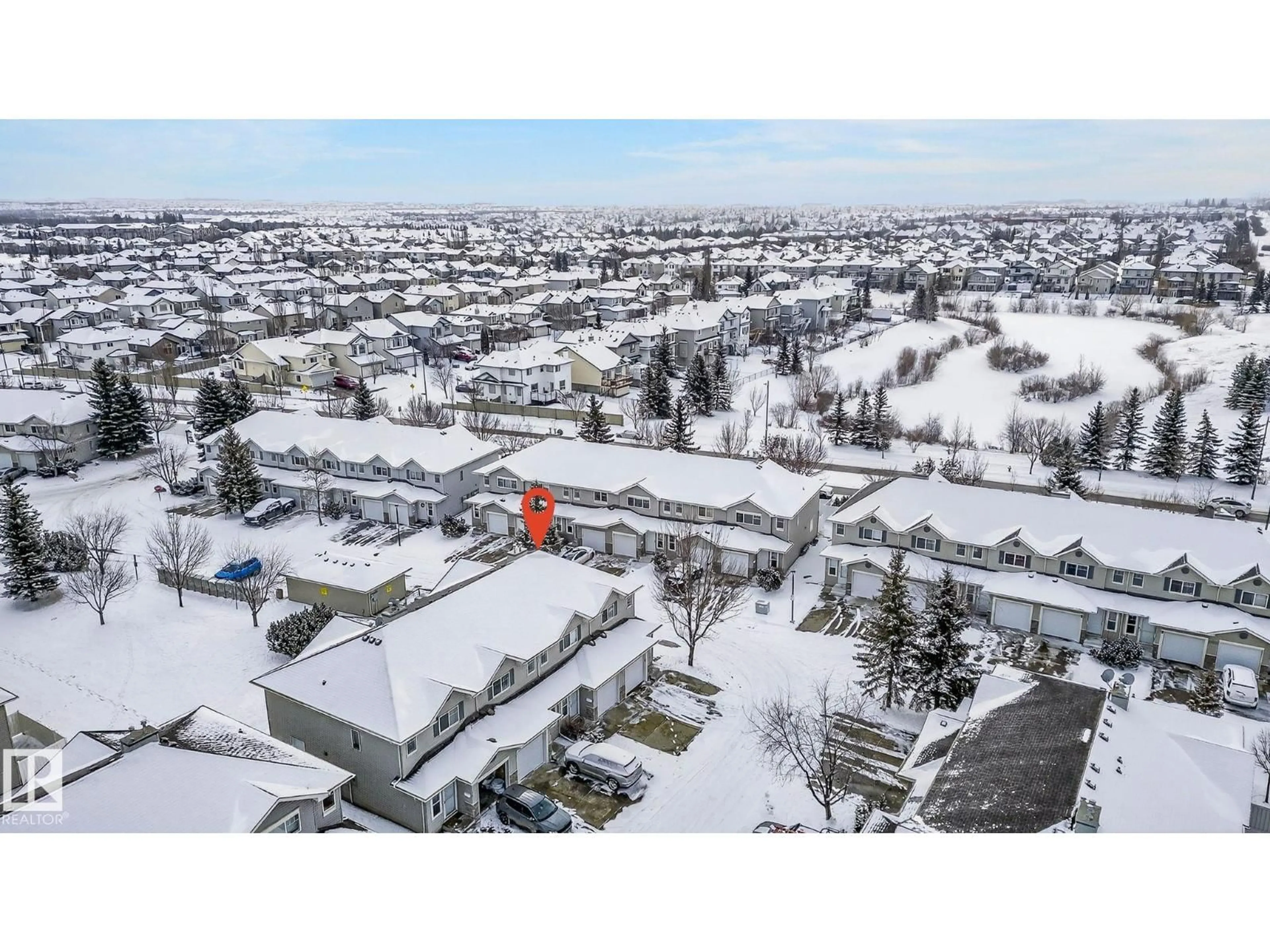 A pic from outside/outdoor area/front of a property/back of a property/a pic from drone, unknown for 230 - 176 EDWARDS DR, Edmonton Alberta T6X1G7