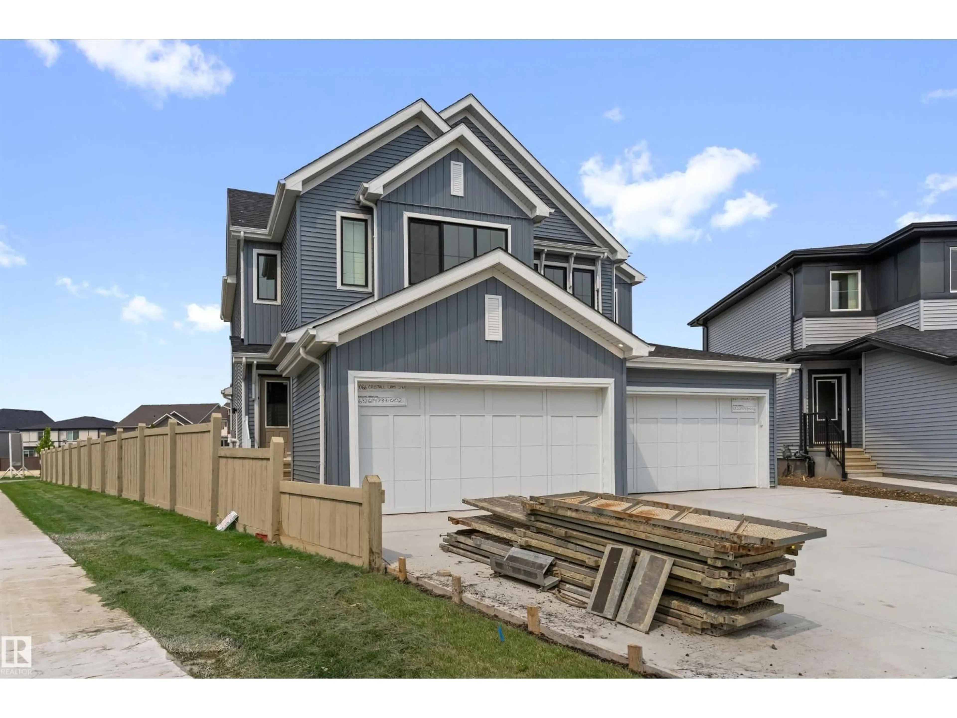 Home with vinyl exterior material, street for SW - 1066 CRISTALL CR, Edmonton Alberta T6W5S6