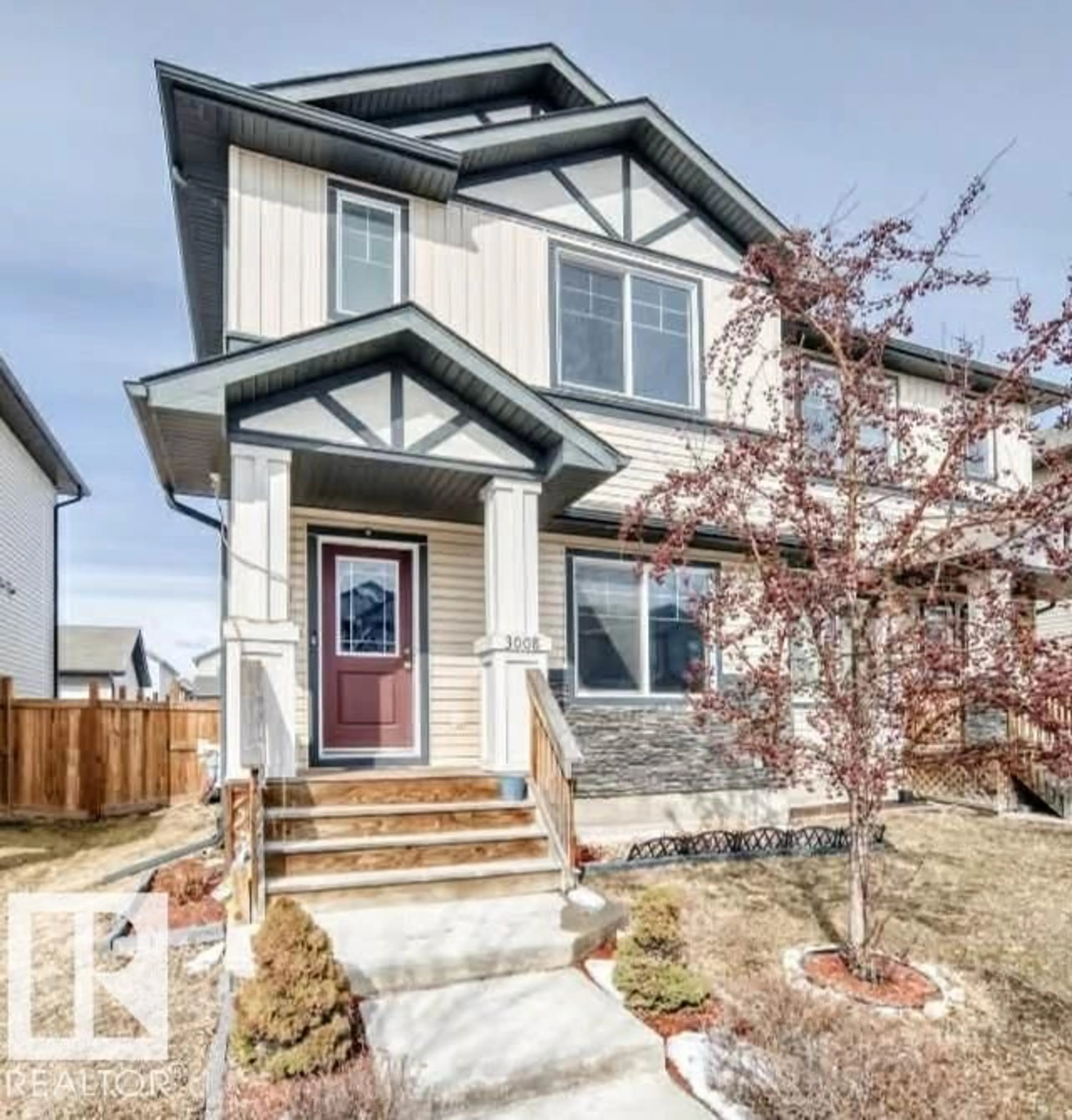 Home with vinyl exterior material, street for NW NW - 3008 17 AV AV, Edmonton Alberta T6T0R9