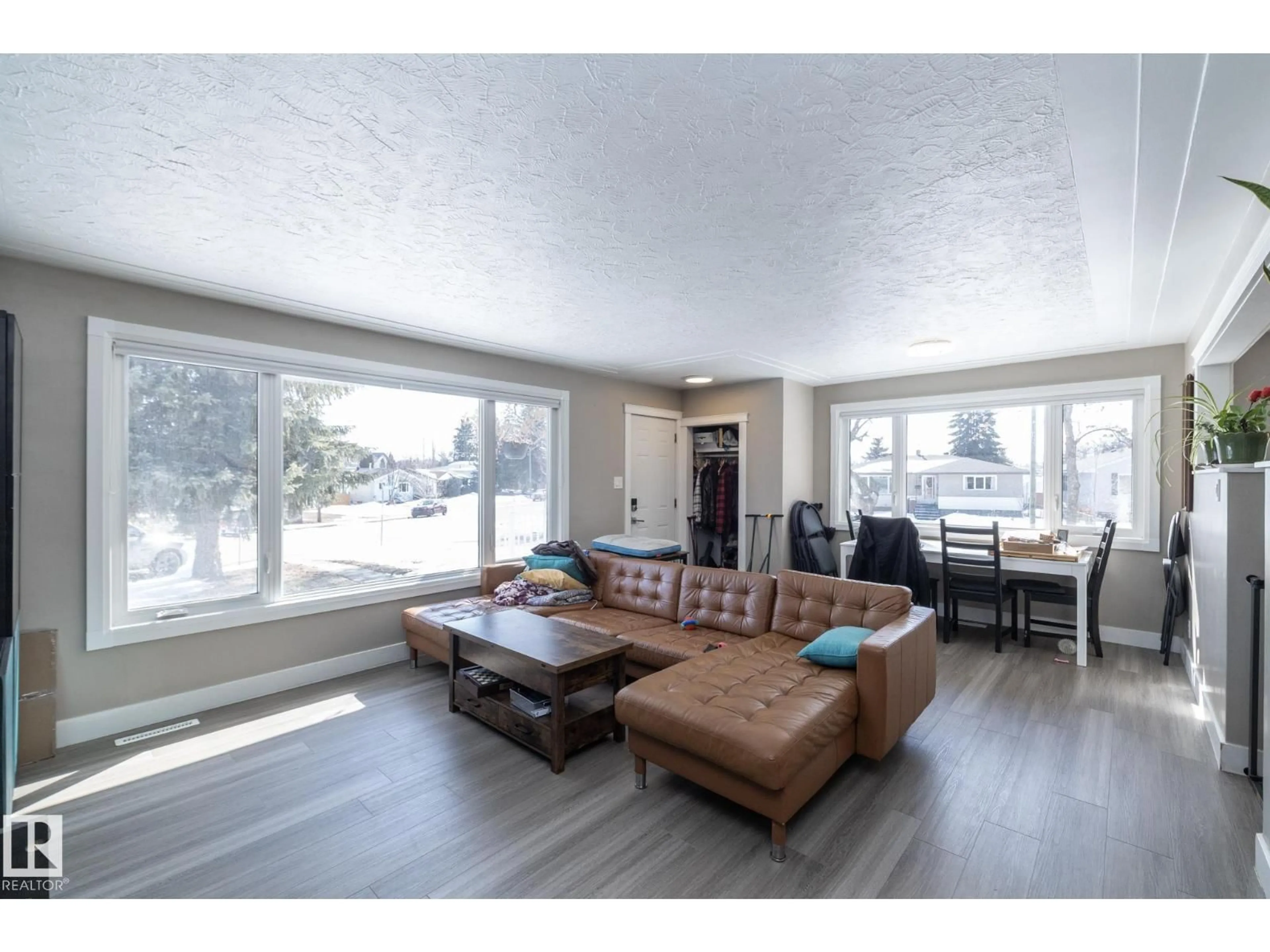 Living room with furniture, wood/laminate floor for 12 MILL DR, St. Albert Alberta T8N1J6