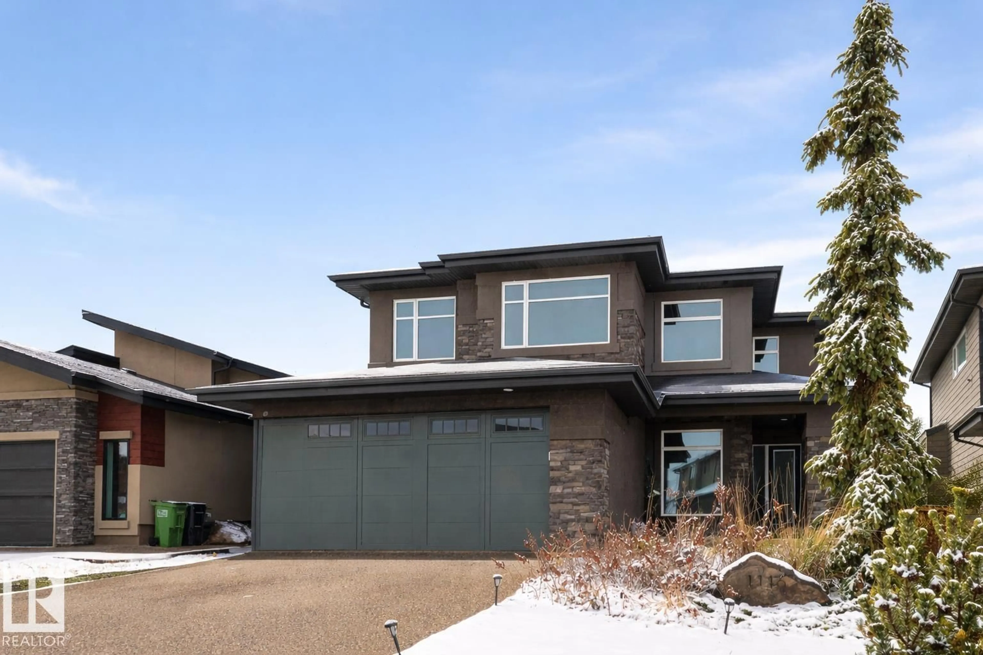Home with brick exterior material, street for GR SW - 1116 HAINSTOCK GREEN, Edmonton Alberta T6W2T8