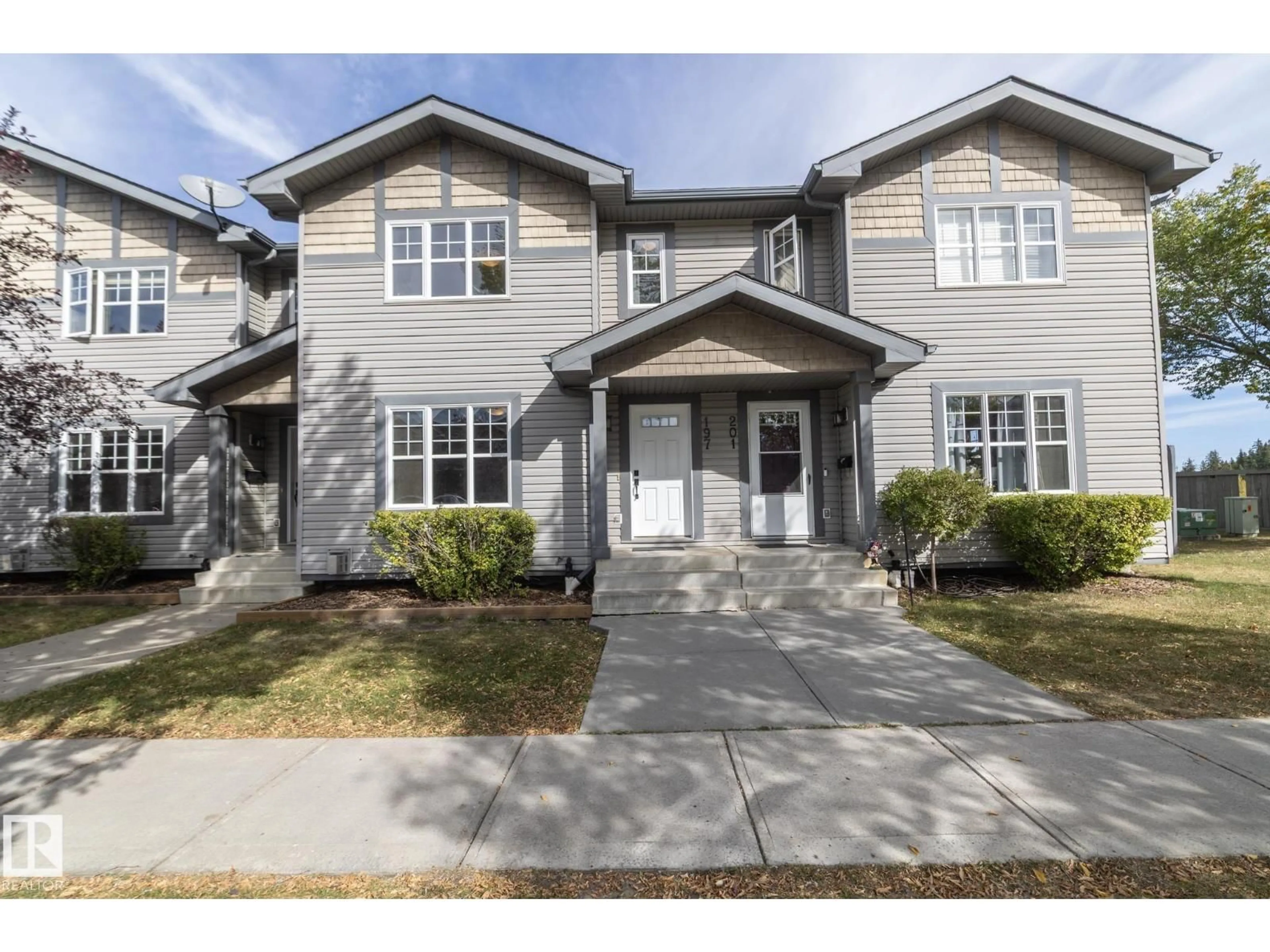 Home with vinyl exterior material, street for 197 BIRCHWOOD CL, Devon Alberta T9G0A5