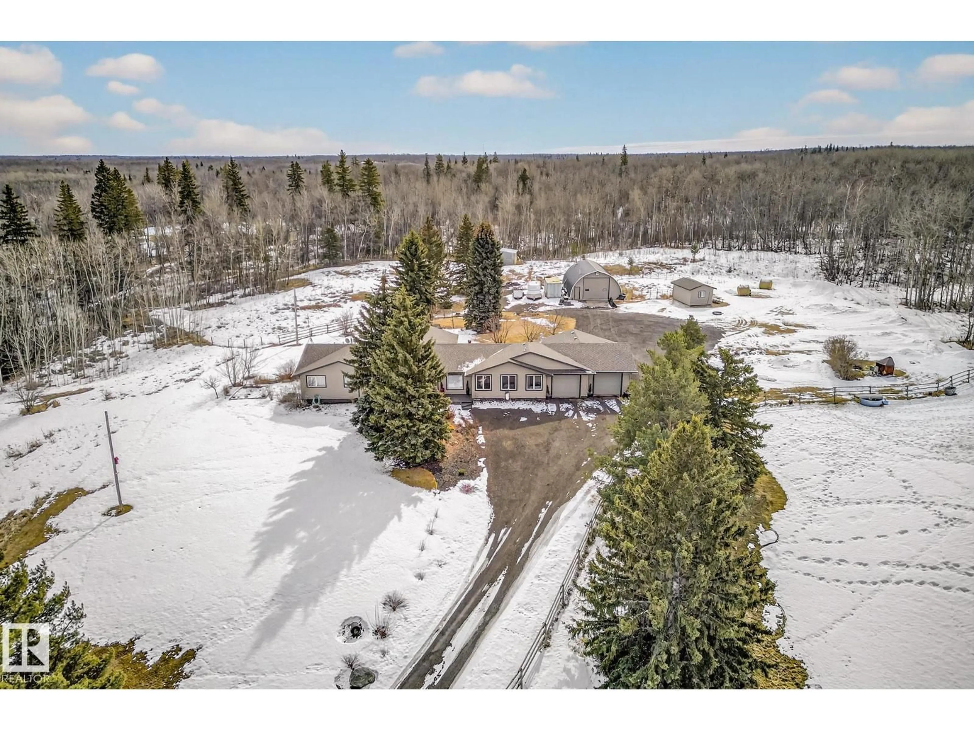 A pic from outside/outdoor area/front of a property/back of a property/a pic from drone, unknown for 22245 TWP ROAD 512, Rural Strathcona County Alberta T8C1H2