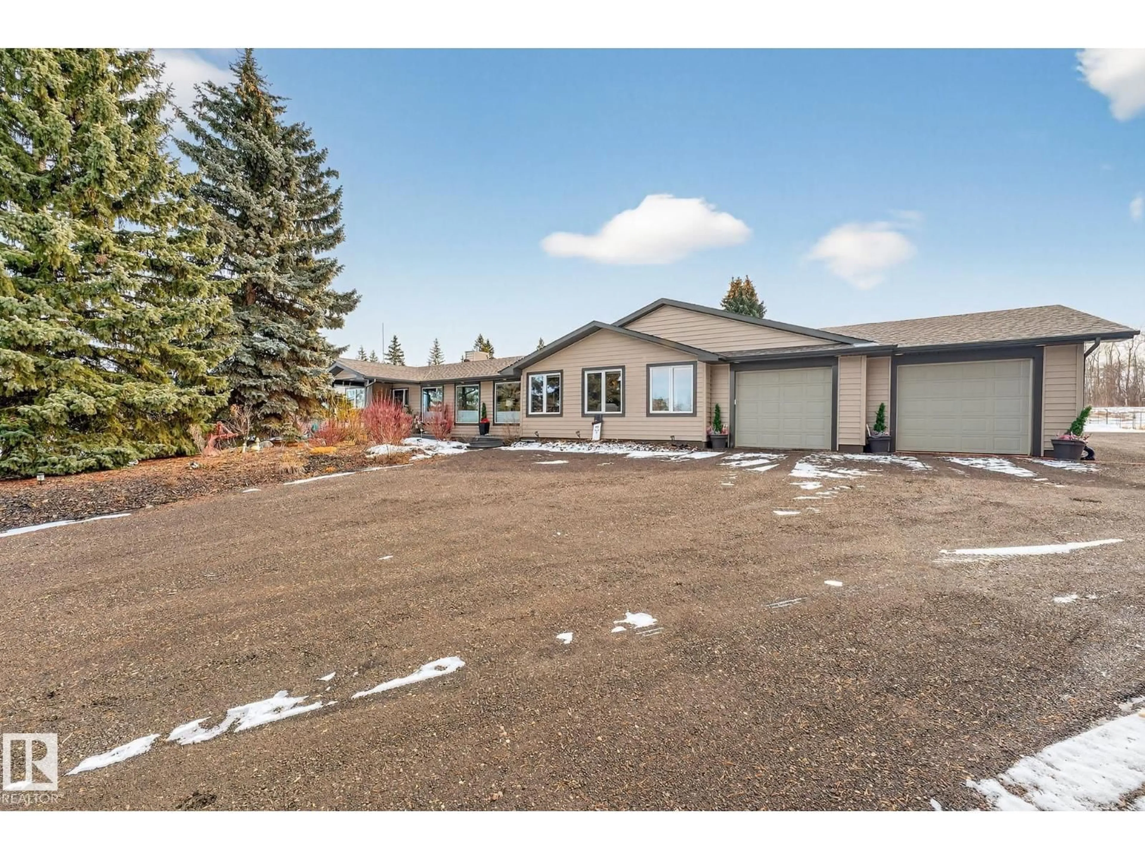 A pic from outside/outdoor area/front of a property/back of a property/a pic from drone, unknown for 22245 TWP ROAD 512, Rural Strathcona County Alberta T8C1H2