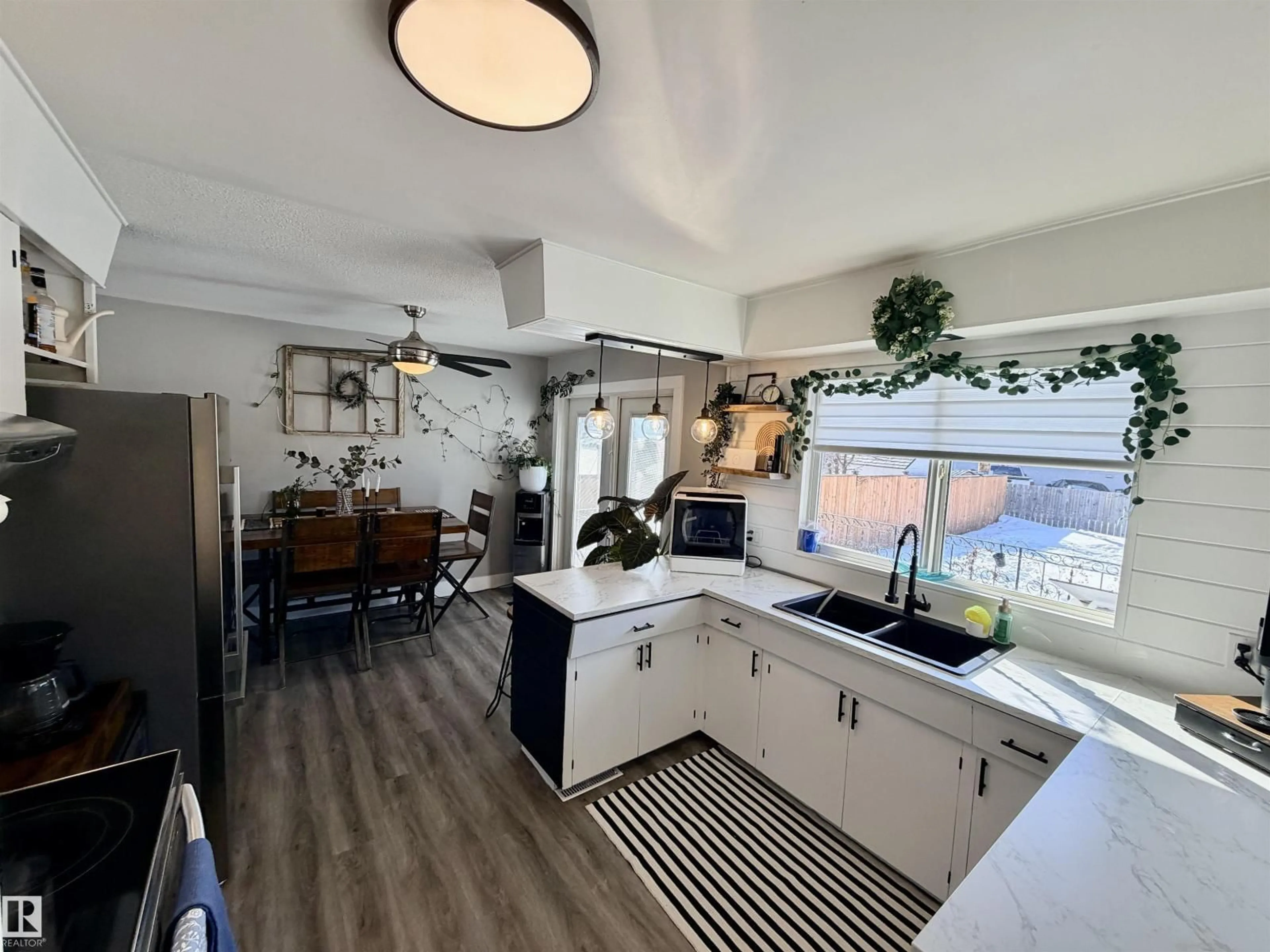 Open concept kitchen, ceramic/tile floor for 4429 51 AV, St. Paul Town Alberta T0A3A2