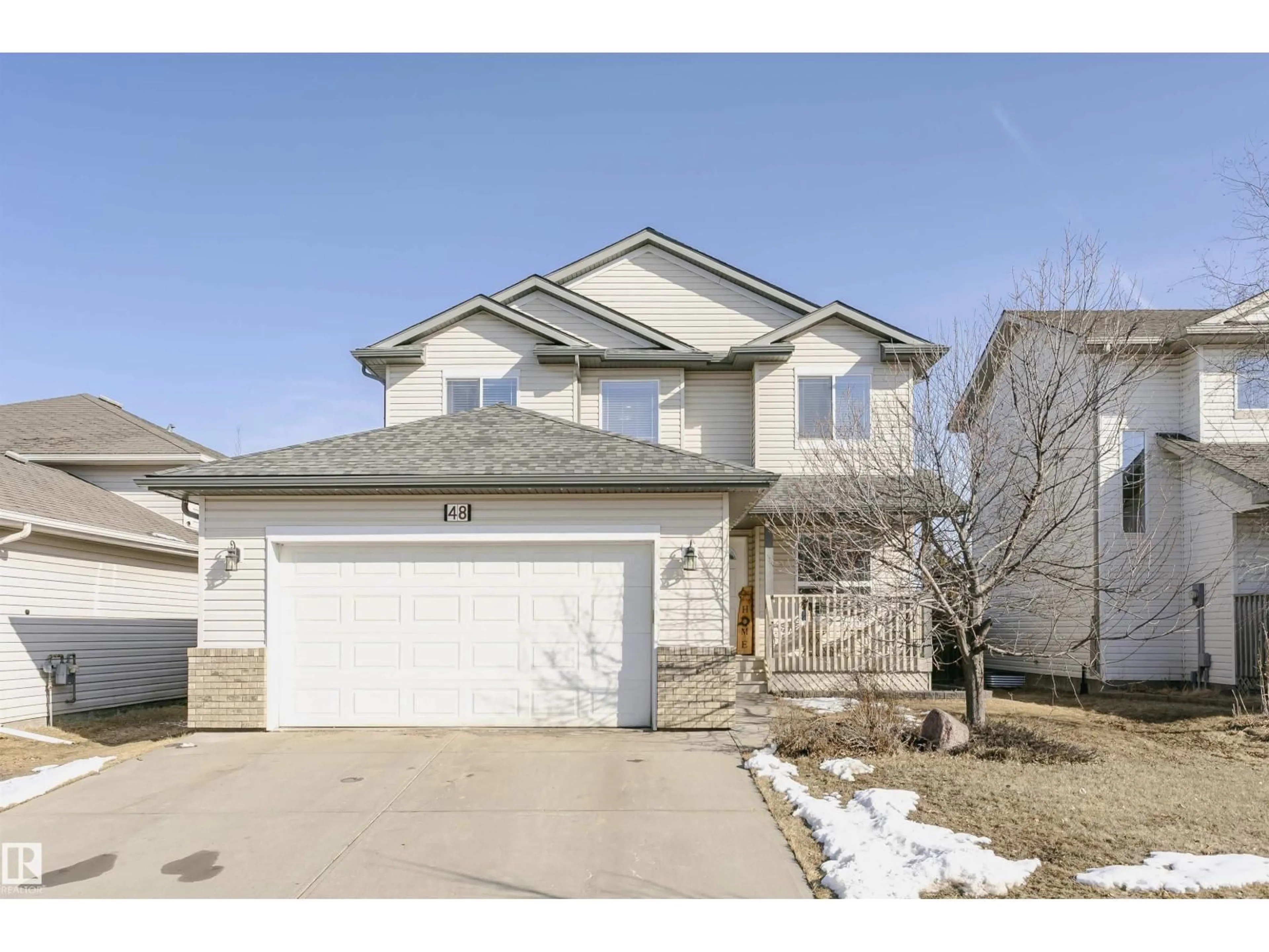 Home with vinyl exterior material, street for 48 CARRIERE CR, Beaumont Alberta T4X0A8