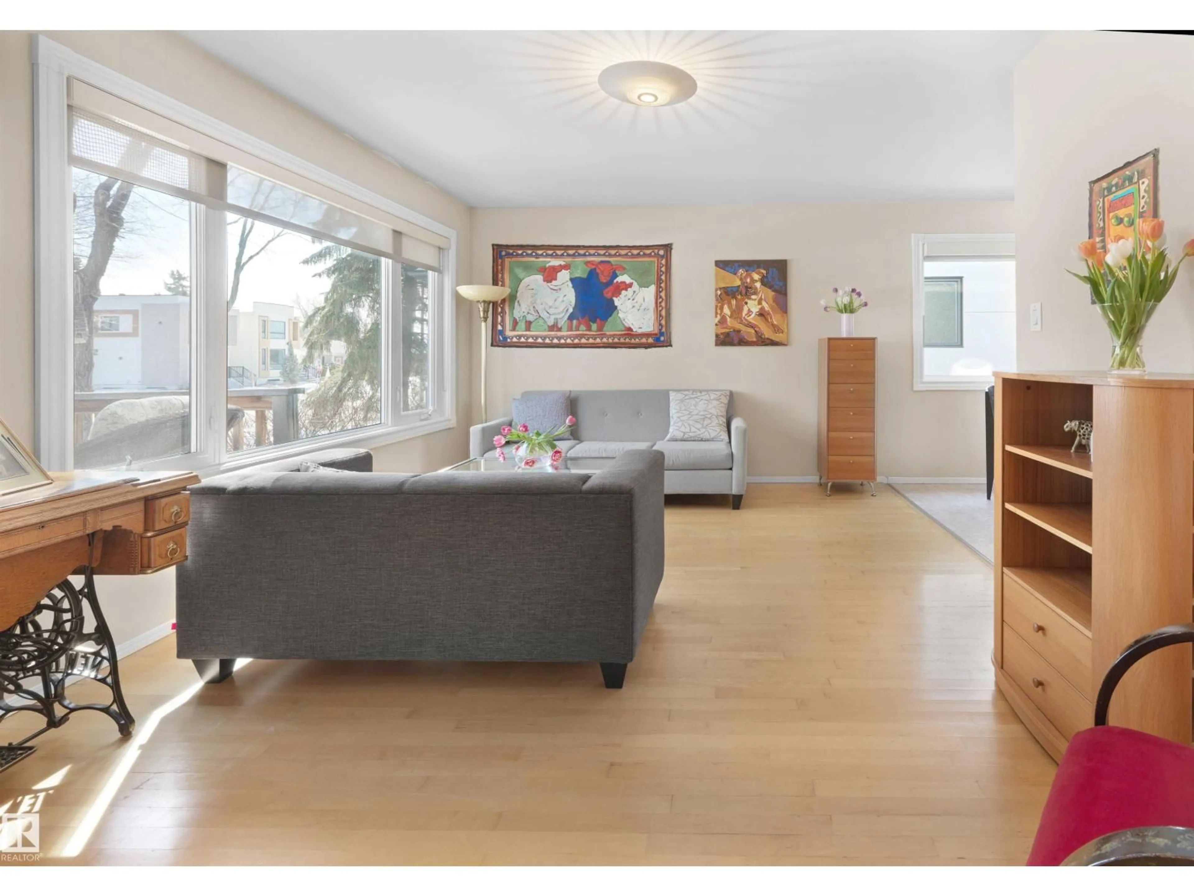 Living room with furniture, wood/laminate floor for 9708 146 ST, Edmonton Alberta T5N2Z4