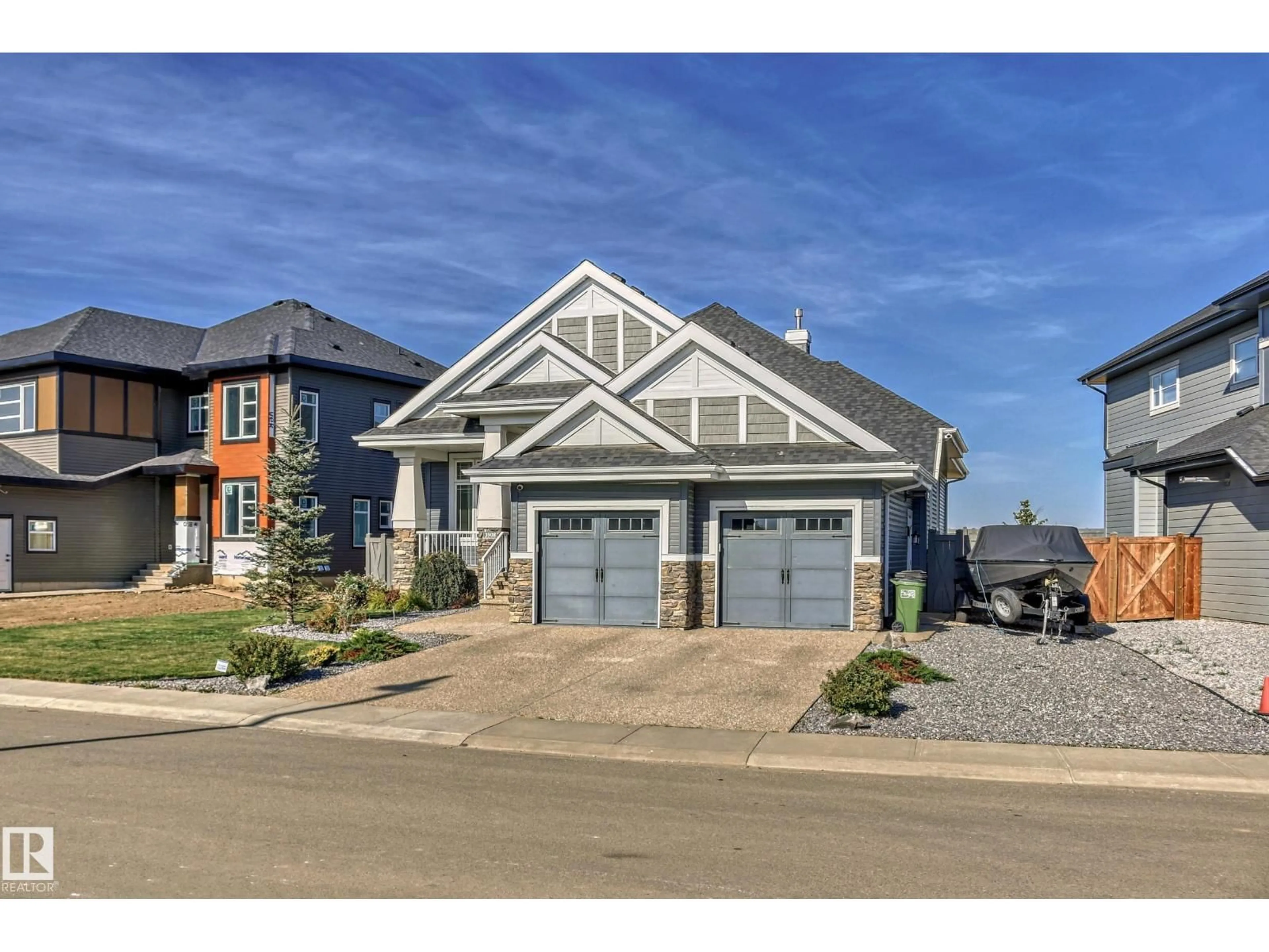 Home with brick exterior material, street for 3908 GINSBURG CR, Edmonton Alberta T5T4V2