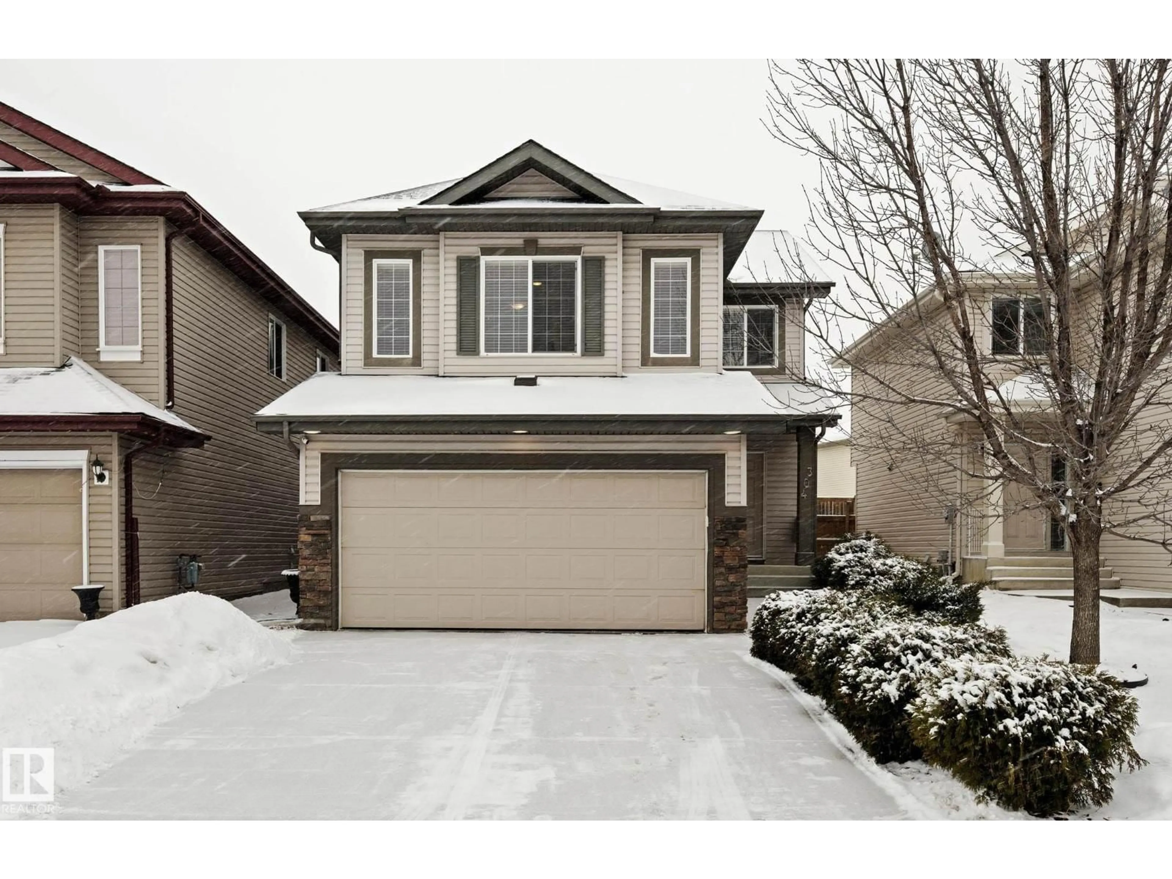 Home with vinyl exterior material, street for SW - 304 79 ST, Edmonton Alberta T6X1N1