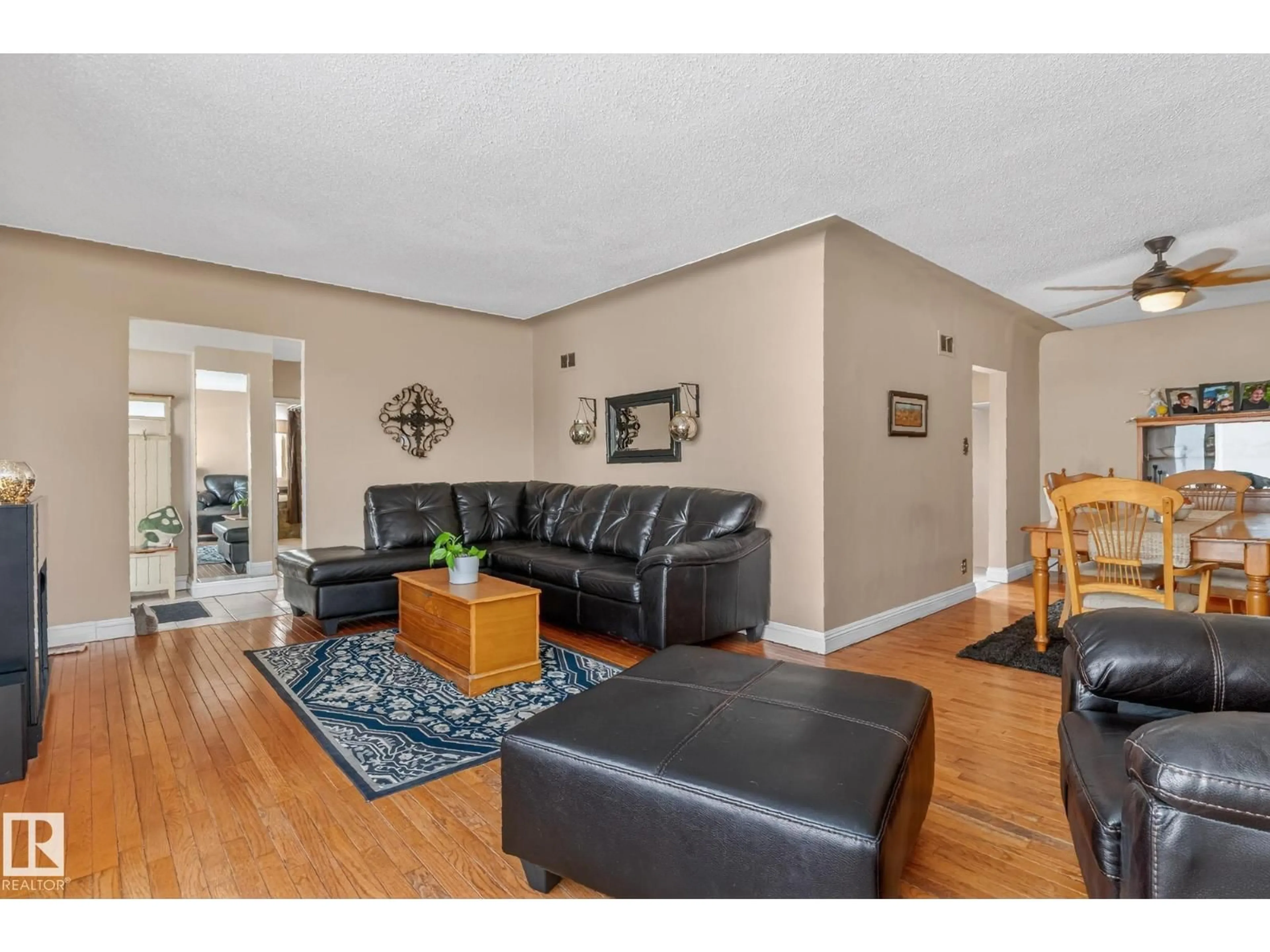 Living room with furniture, wood/laminate floor for 160068 TWP 531, Rural Lamont County Alberta T0B3H0