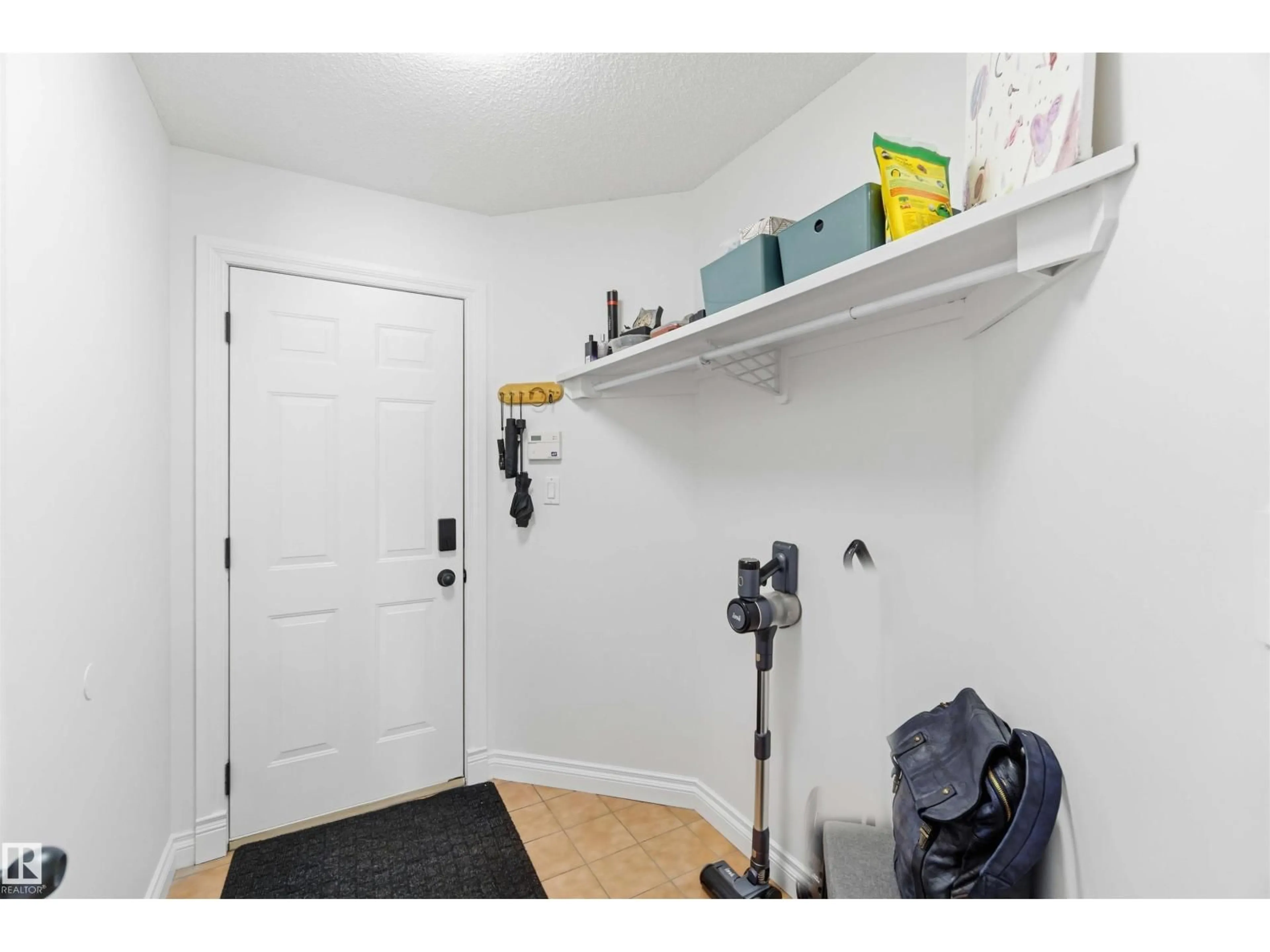 Storage room or clothes room or walk-in closet for NW - 1324 116 ST, Edmonton Alberta T6J7B3