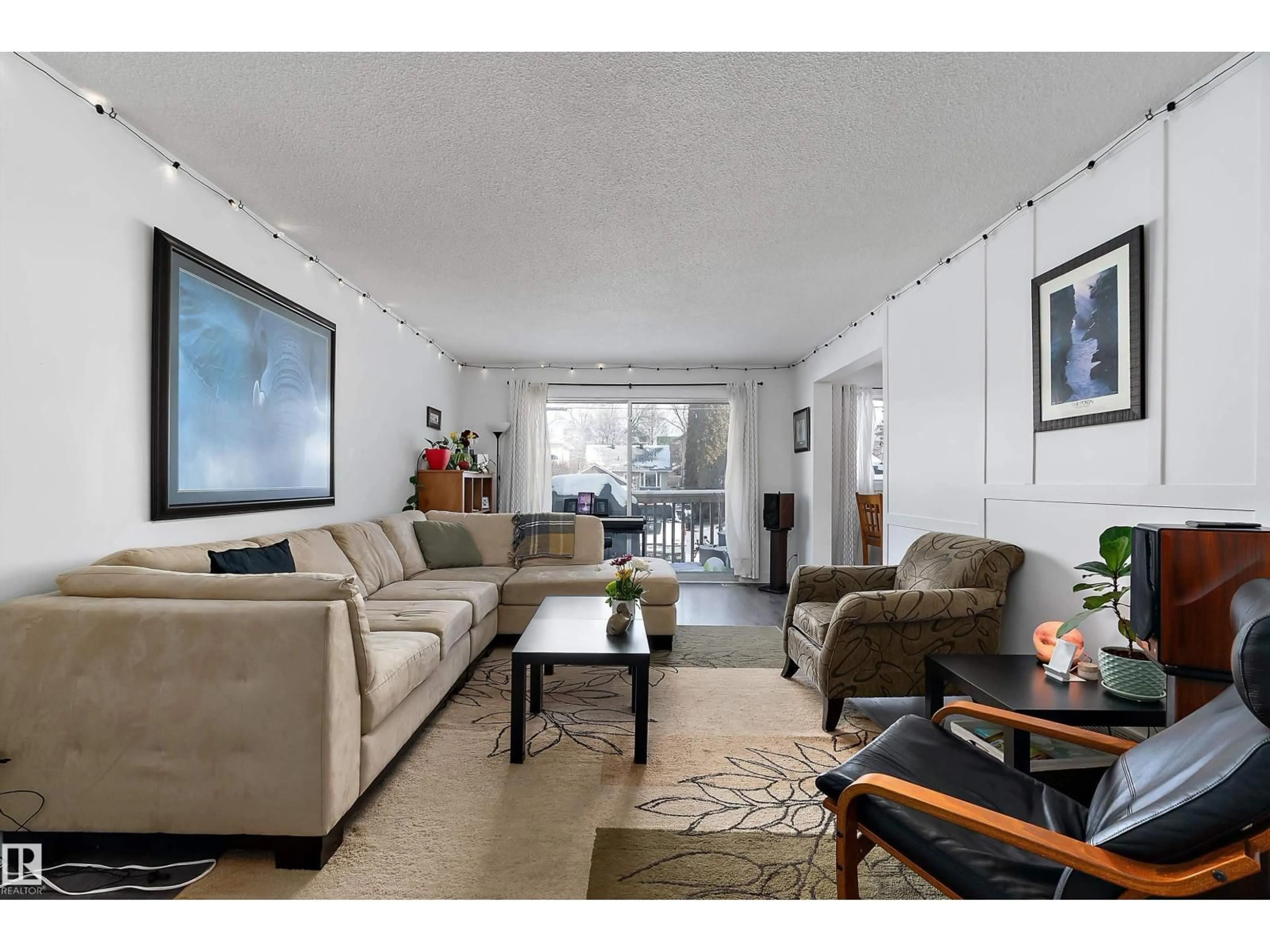 Living room with furniture, unknown for 9326 80 AV, Edmonton Alberta T6C0T9