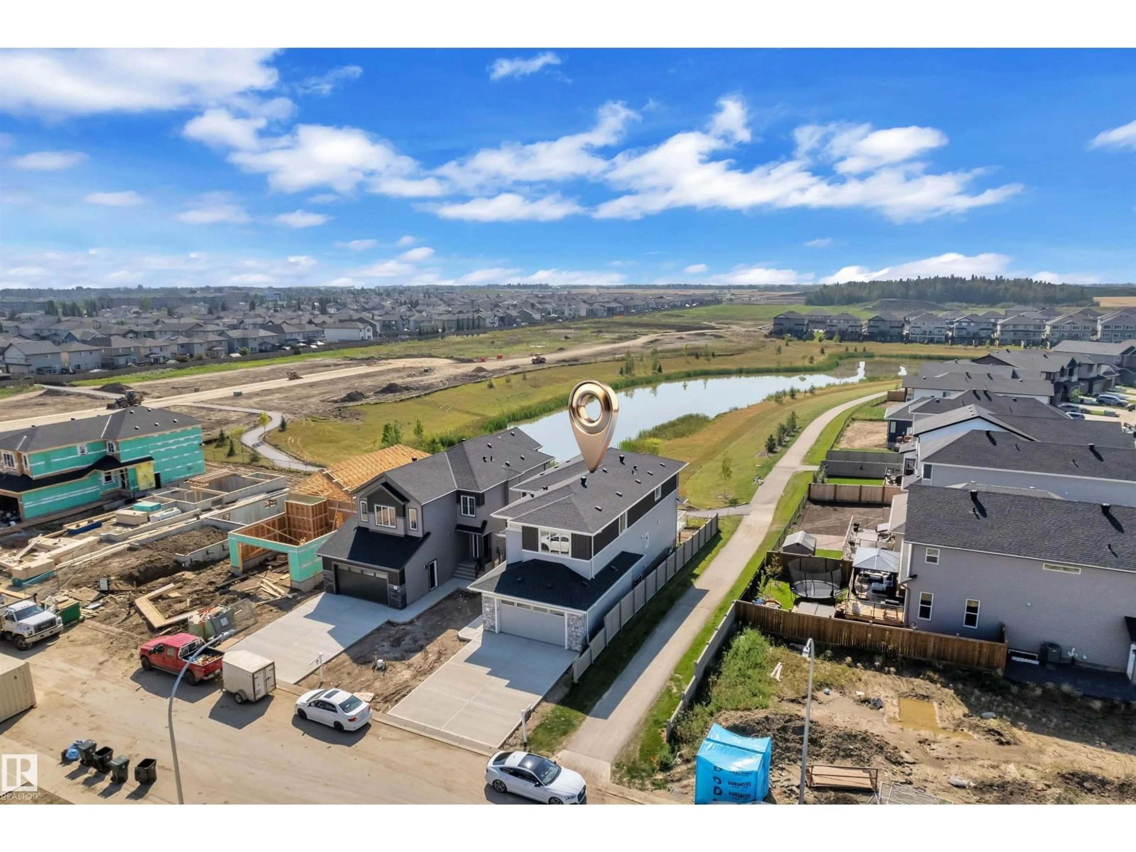 A pic from outside/outdoor area/front of a property/back of a property/a pic from drone, water/lake/river/ocean view for 176 CALEDON CR, Spruce Grove Alberta T7X4E3