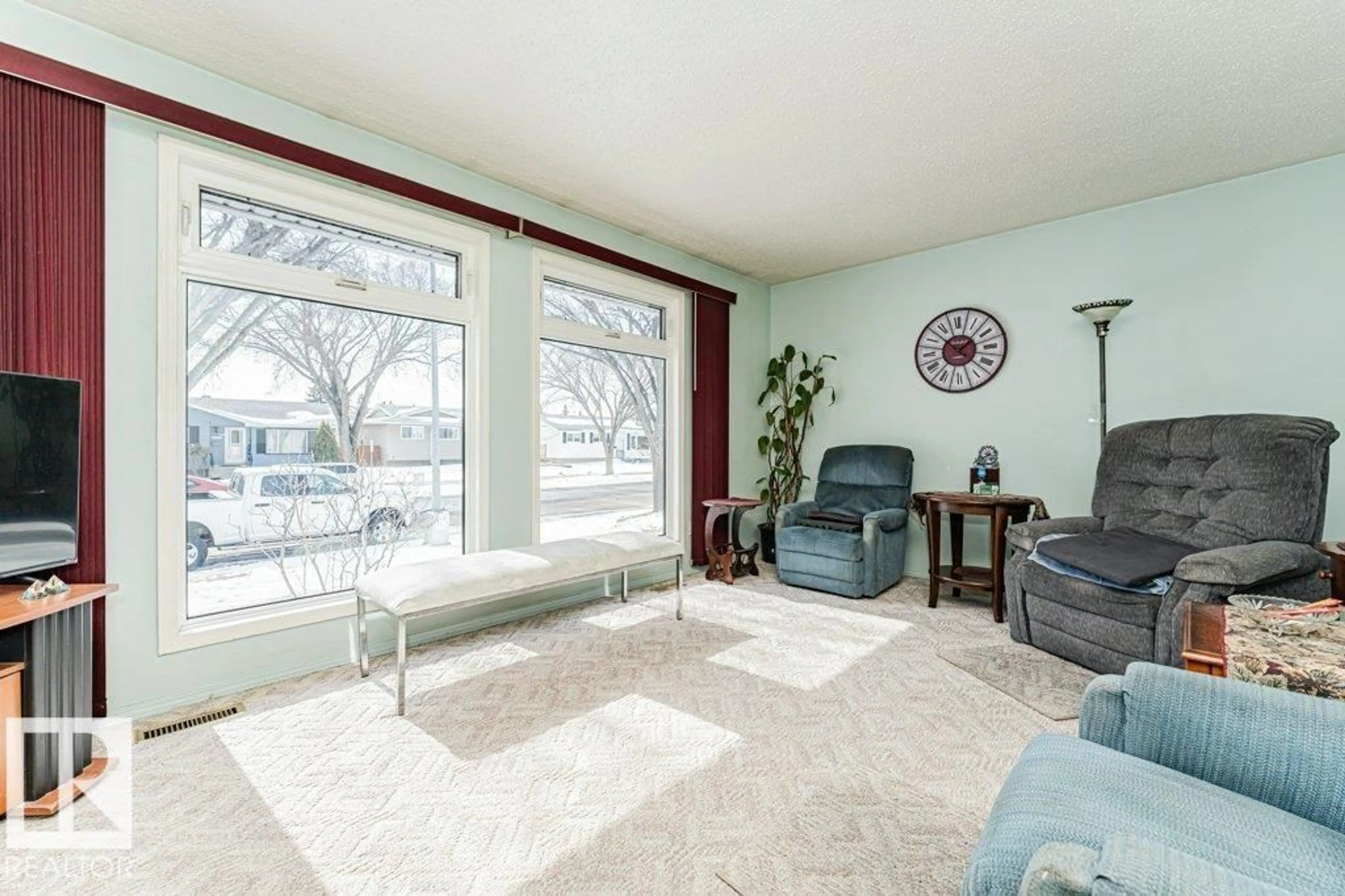 Living room with furniture, unknown for NW - 11516 145 AV, Edmonton Alberta T5X4A2