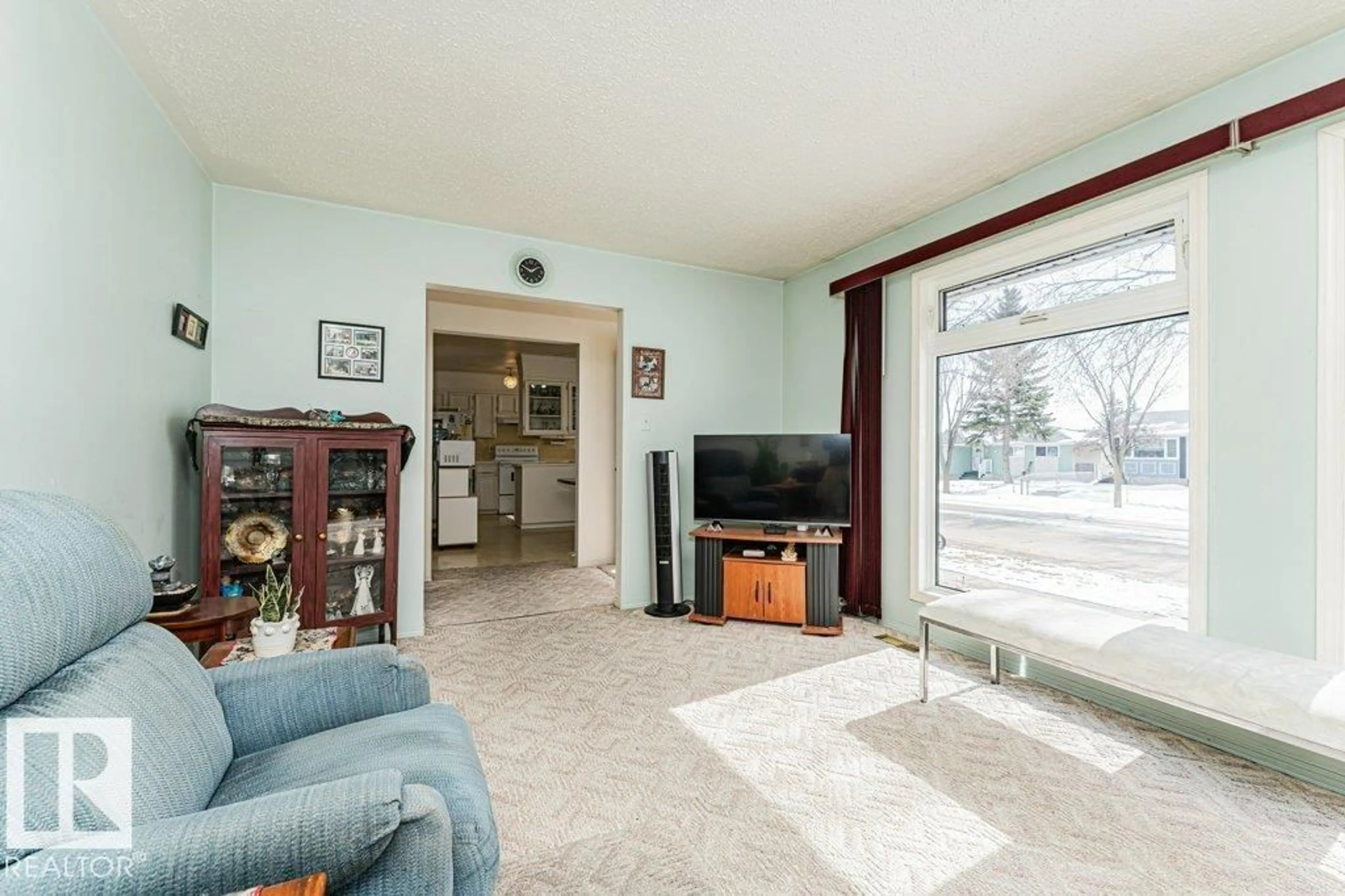 Living room with furniture, unknown for NW - 11516 145 AV, Edmonton Alberta T5X4A2