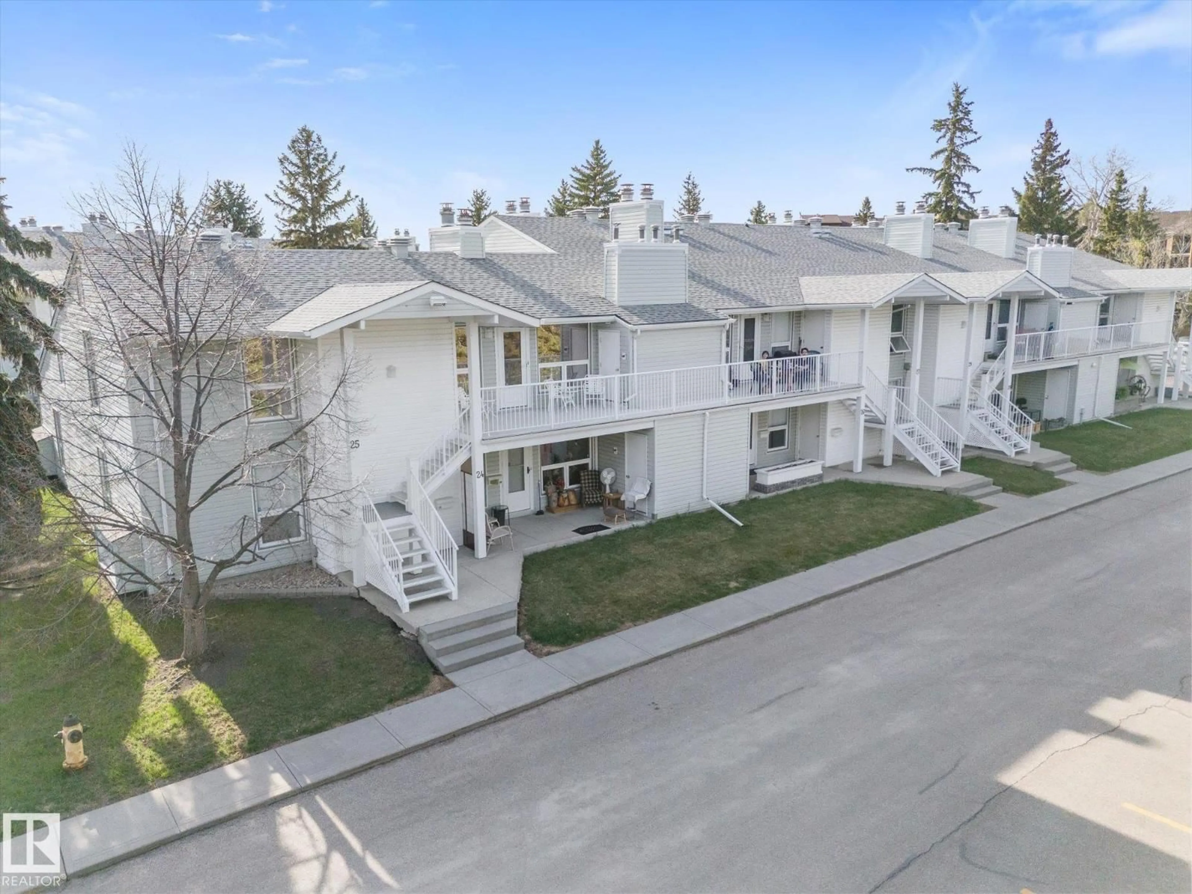 A pic from outside/outdoor area/front of a property/back of a property/a pic from drone, street for 26 - 2115 118 ST, Edmonton Alberta T6J5N1