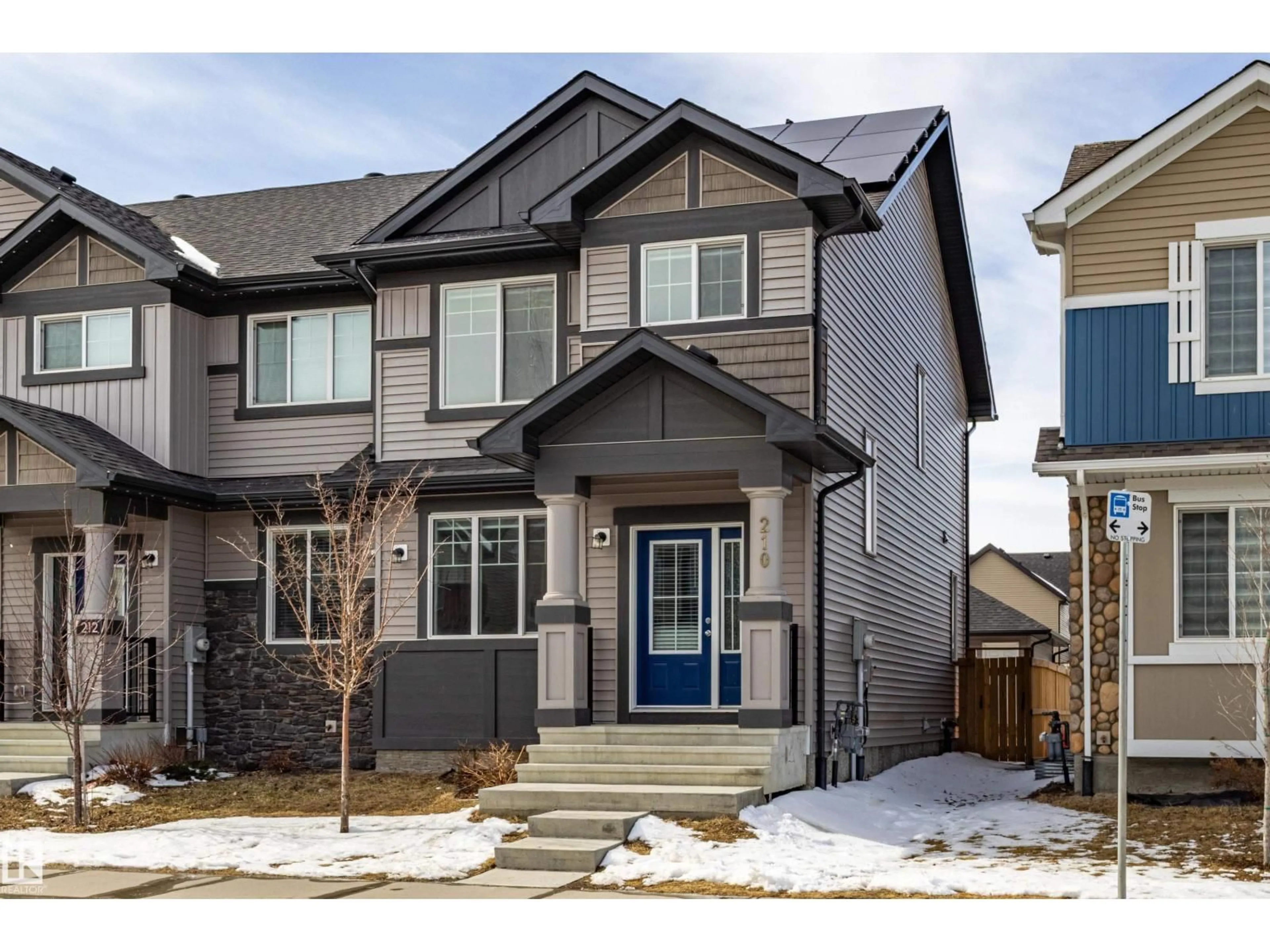 Home with vinyl exterior material, street for 210 DESROCHERS BV, Edmonton Alberta T6W4N2