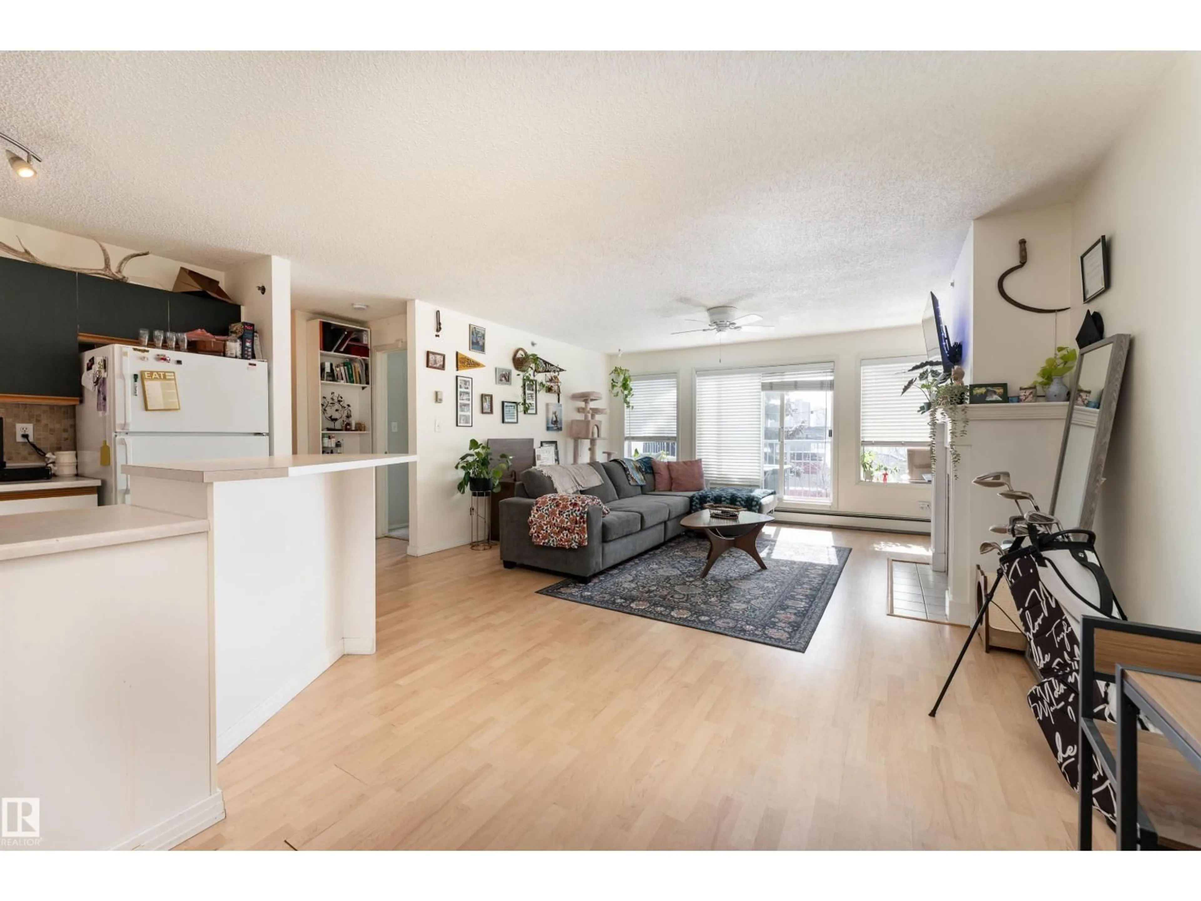 Living room with furniture, unknown for 315 10508 119 ST NW, Edmonton Alberta T5H4M1