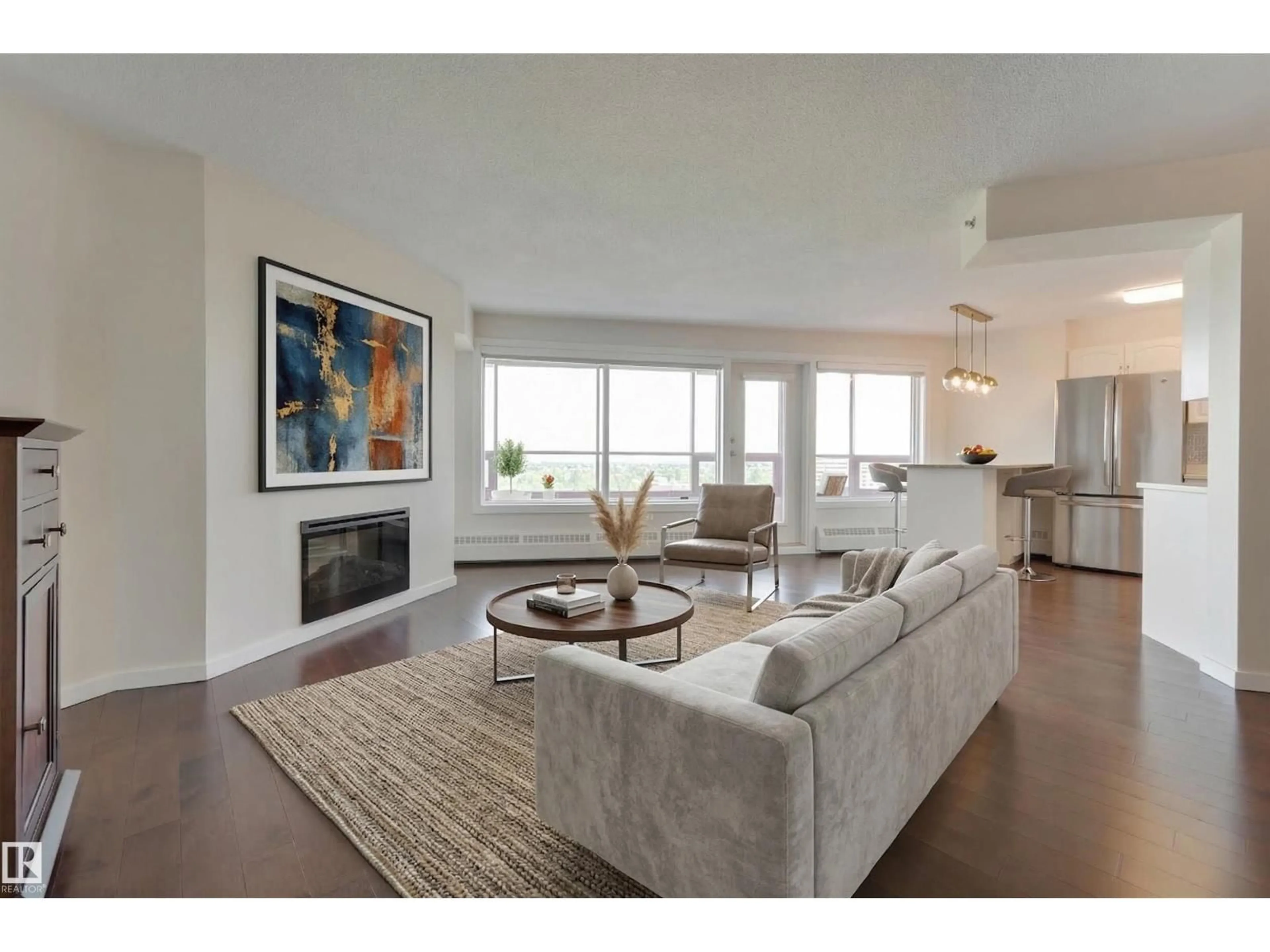 Living room with furniture, unknown for 1003 - 12319 JASPER AV, Edmonton Alberta T5N4A7