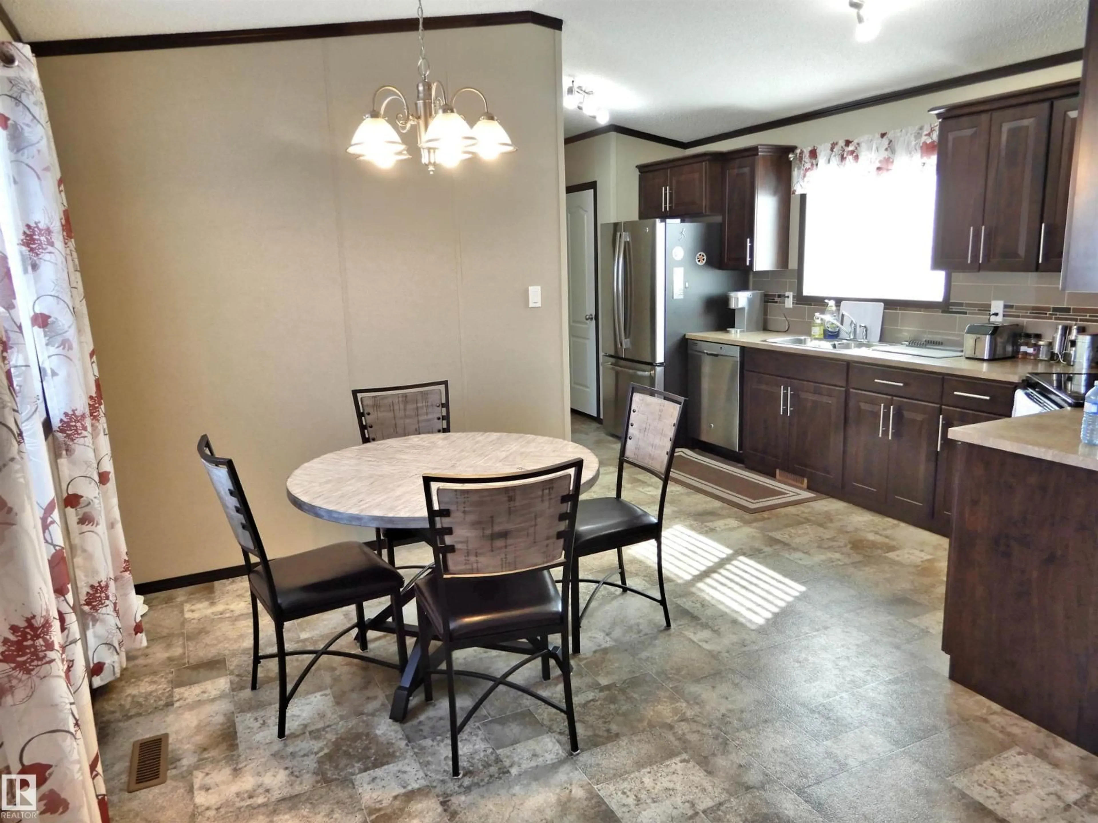 Open concept kitchen, ceramic/tile floor for 3 ASPEN AVENUE, Morinville Alberta T8R2P7