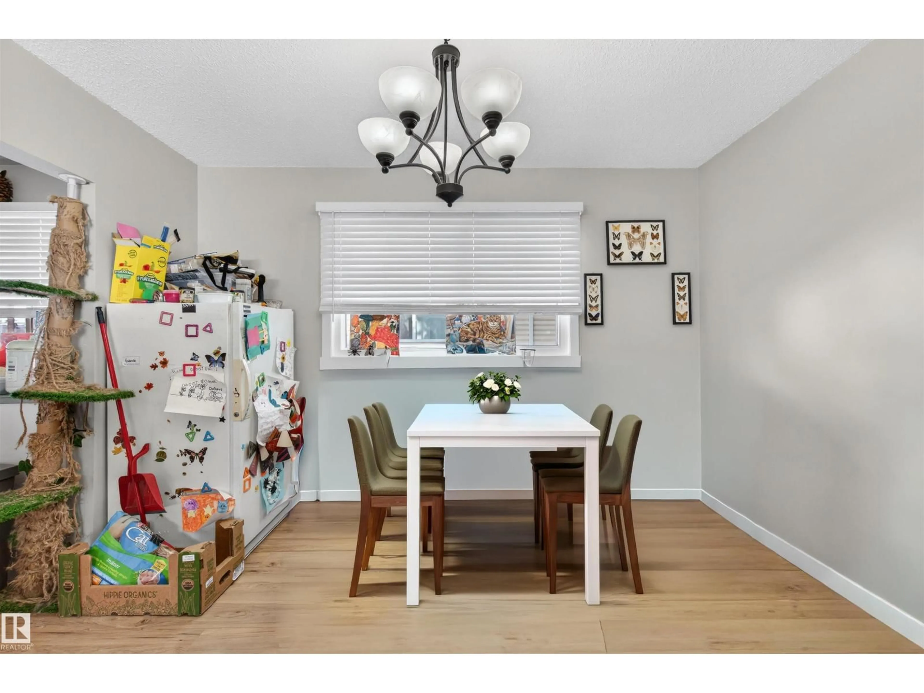 Dining room, wood/laminate floor for 8704 136 AV, Edmonton Alberta T5E3E6