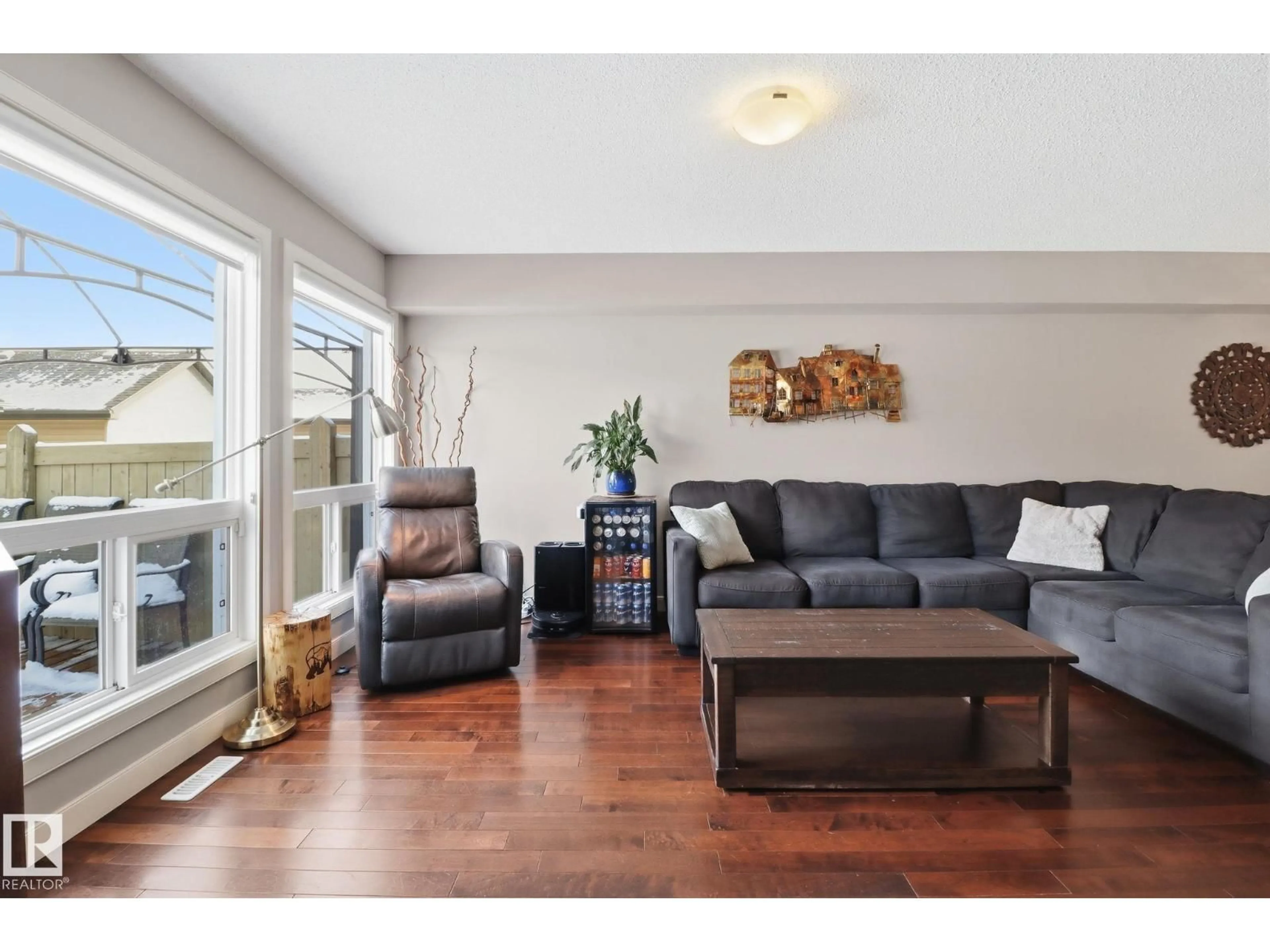 Living room with furniture, wood/laminate floor for SW - 430 WATT BV, Edmonton Alberta T6X1R1