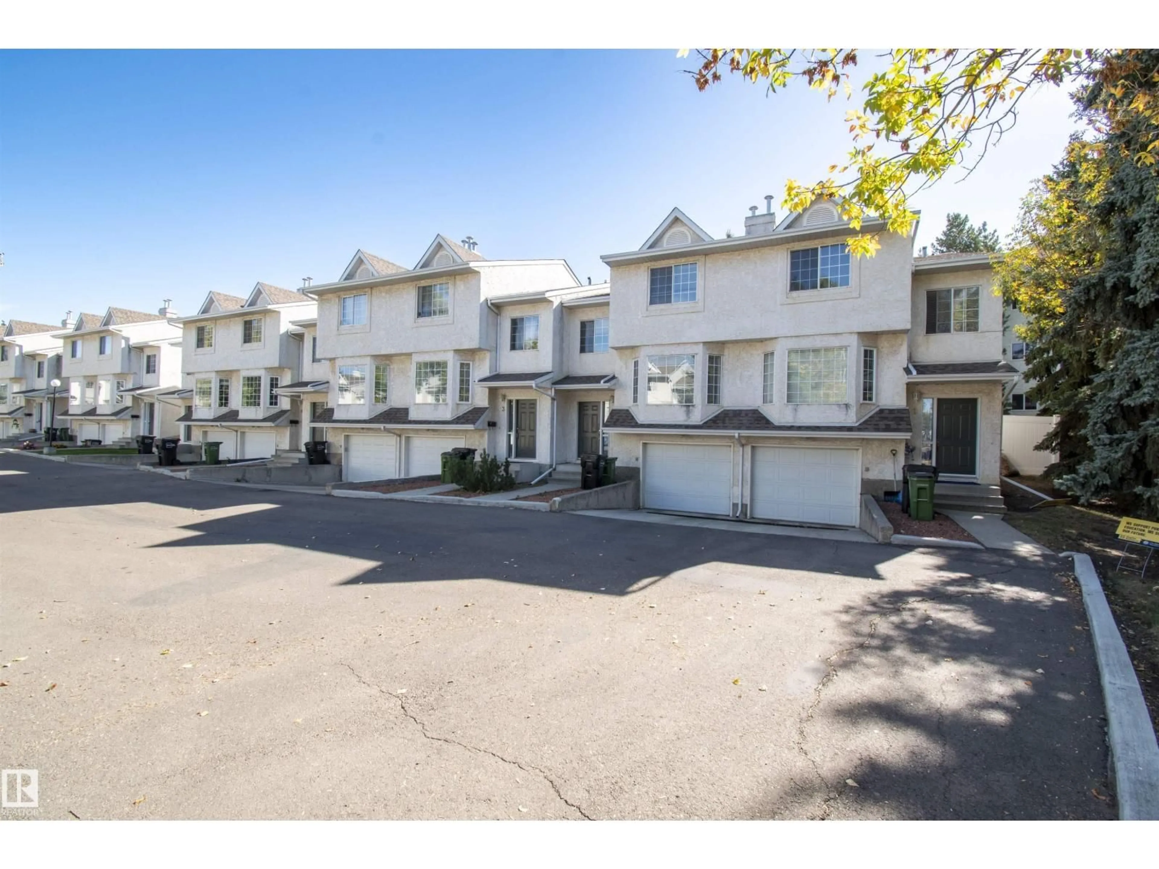 A pic from outside/outdoor area/front of a property/back of a property/a pic from drone, street for #2 - 9703 174 ST, Edmonton Alberta T5T6C5