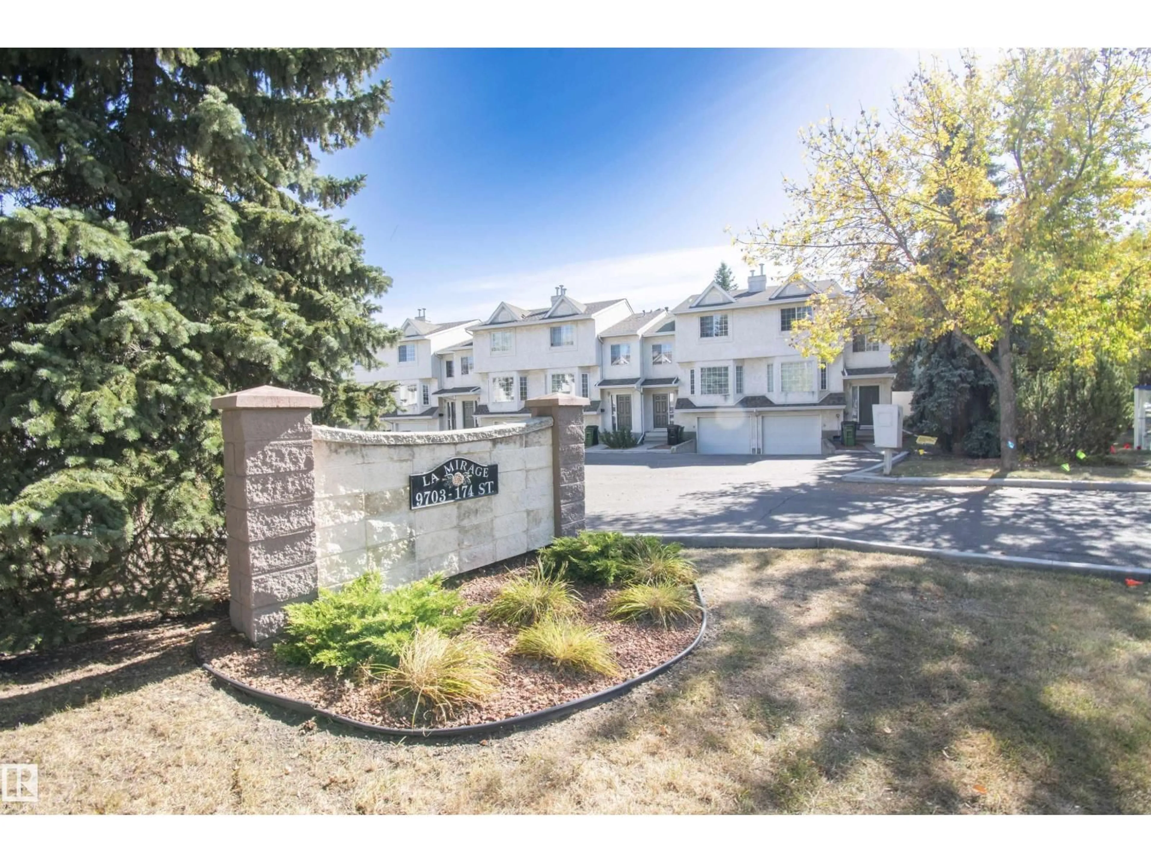 A pic from outside/outdoor area/front of a property/back of a property/a pic from drone, street for #2 - 9703 174 ST, Edmonton Alberta T5T6C5