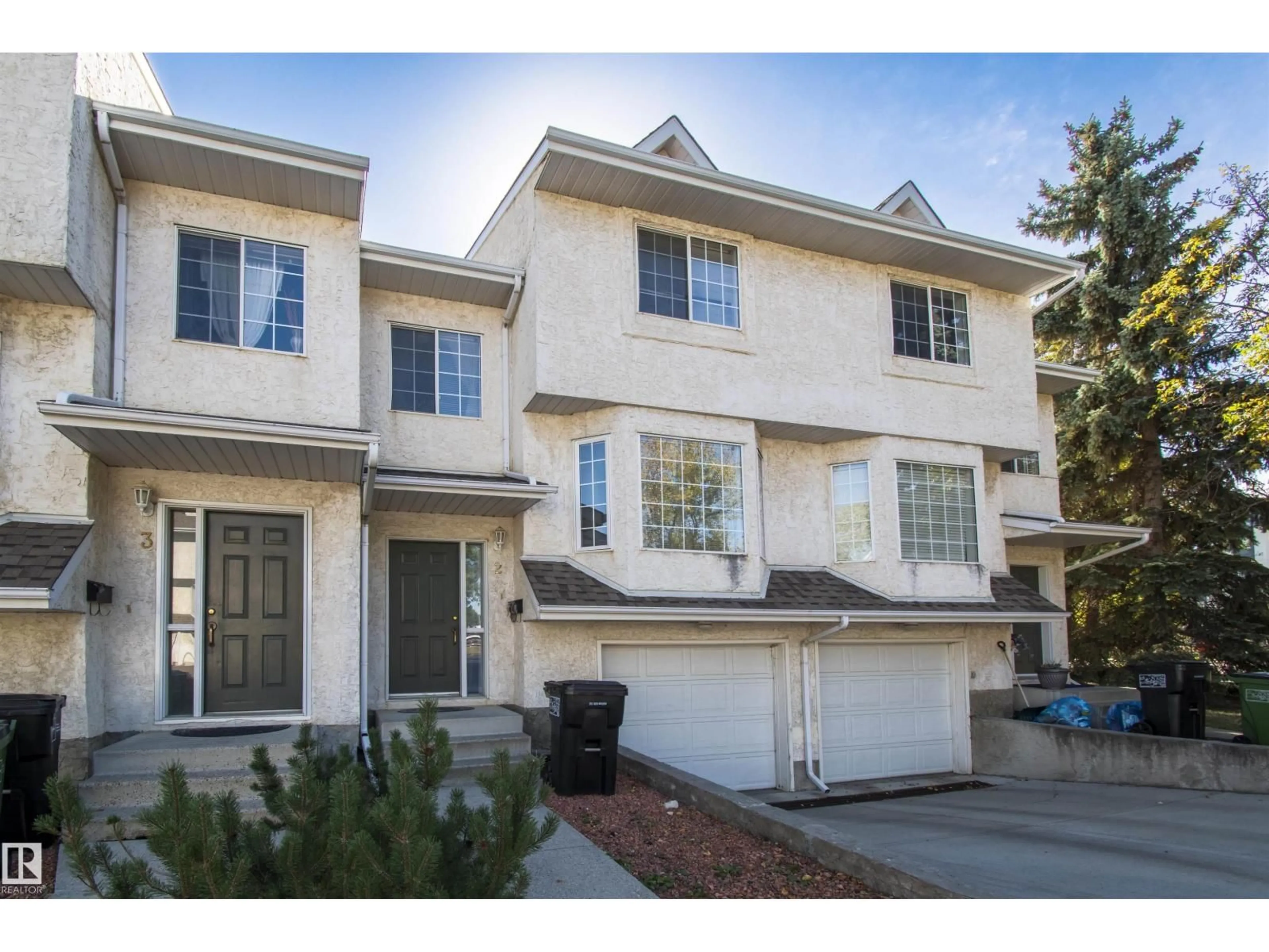 Home with vinyl exterior material, street for #2 - 9703 174 ST, Edmonton Alberta T5T6C5