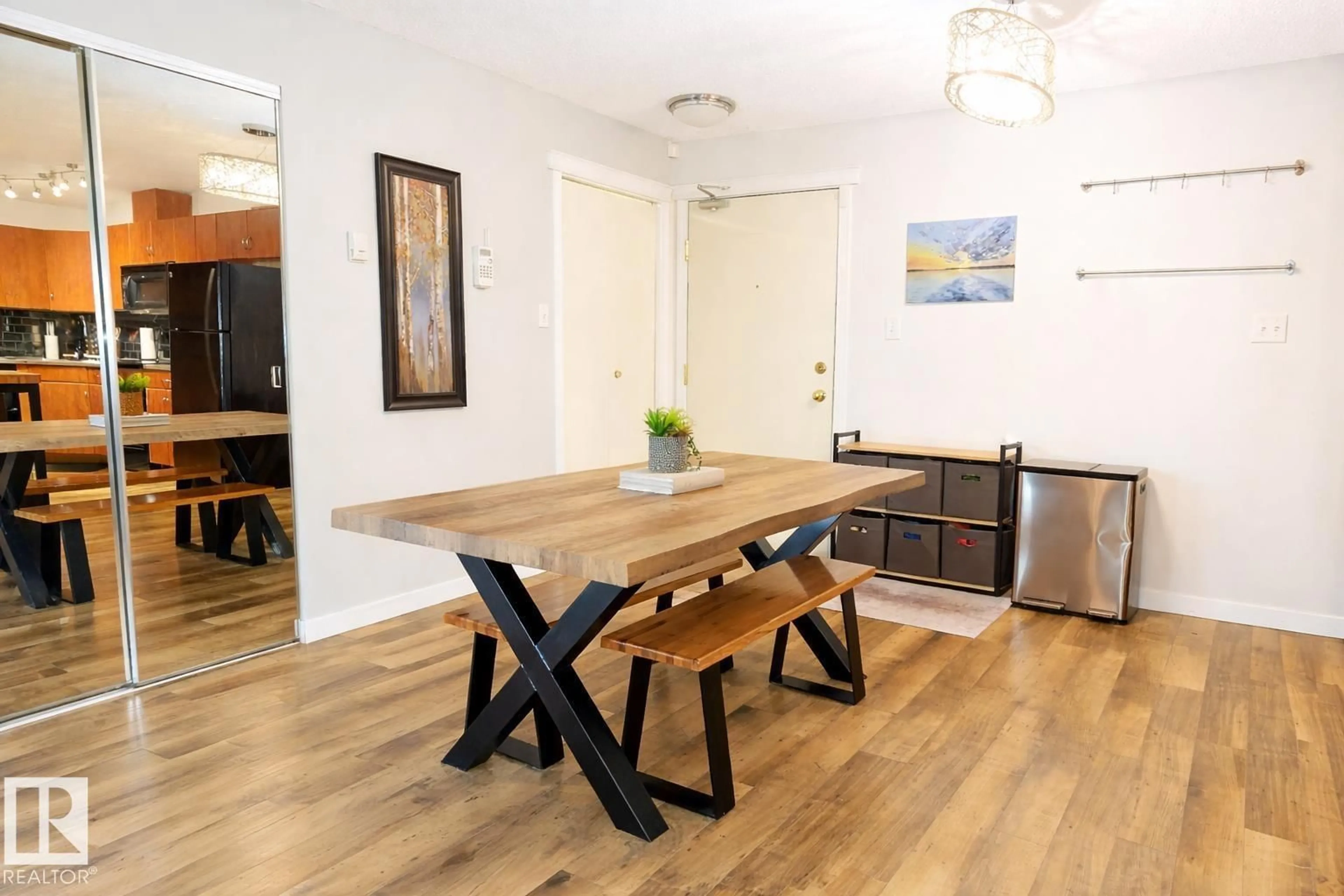 Dining room, wood/laminate floor for 2430 - 118 GUARDIAN RD NW, Edmonton Alberta T5T6X9