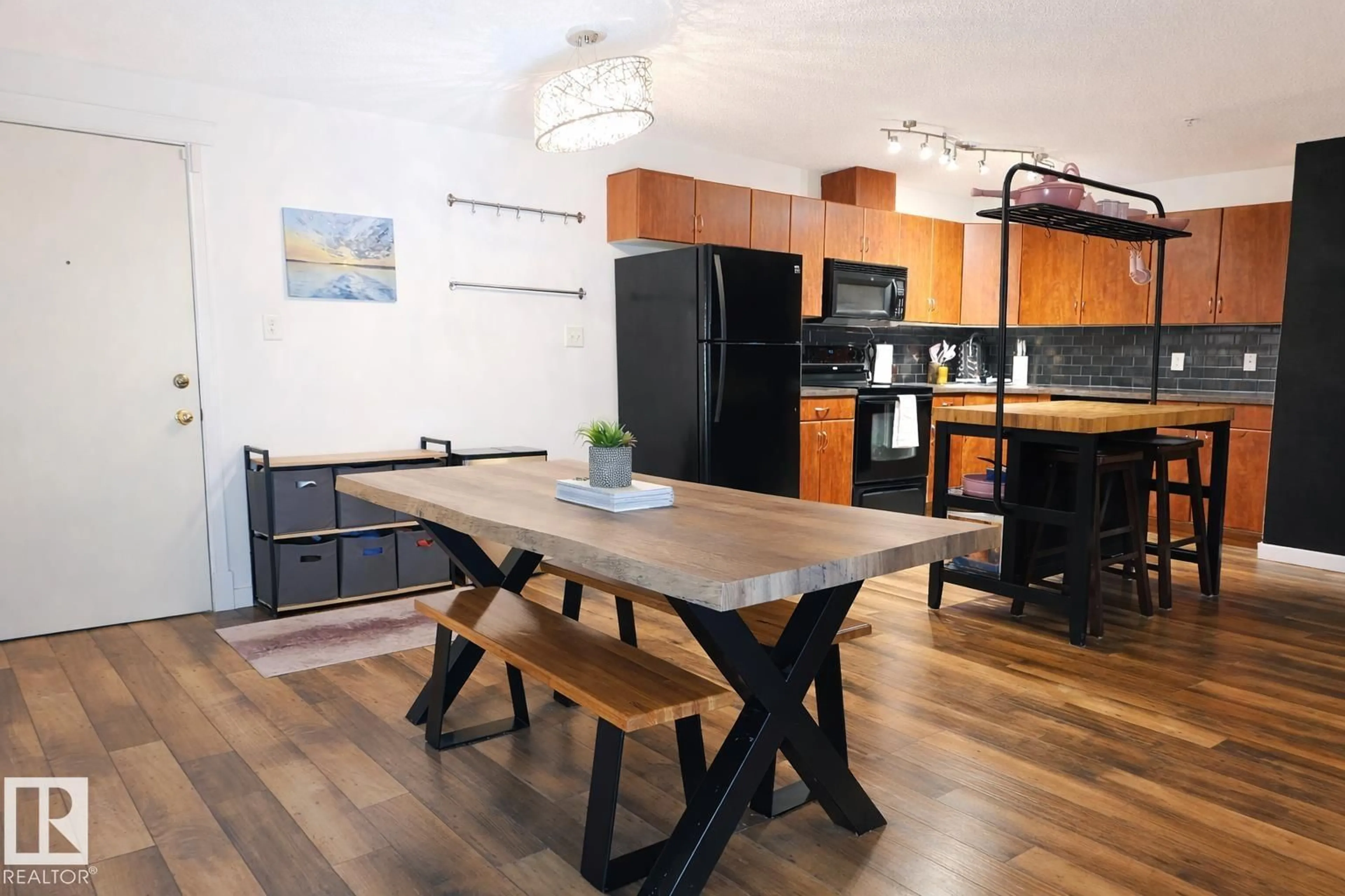 Open concept kitchen, wood/laminate floor for 2430 - 118 GUARDIAN RD NW, Edmonton Alberta T5T6X9