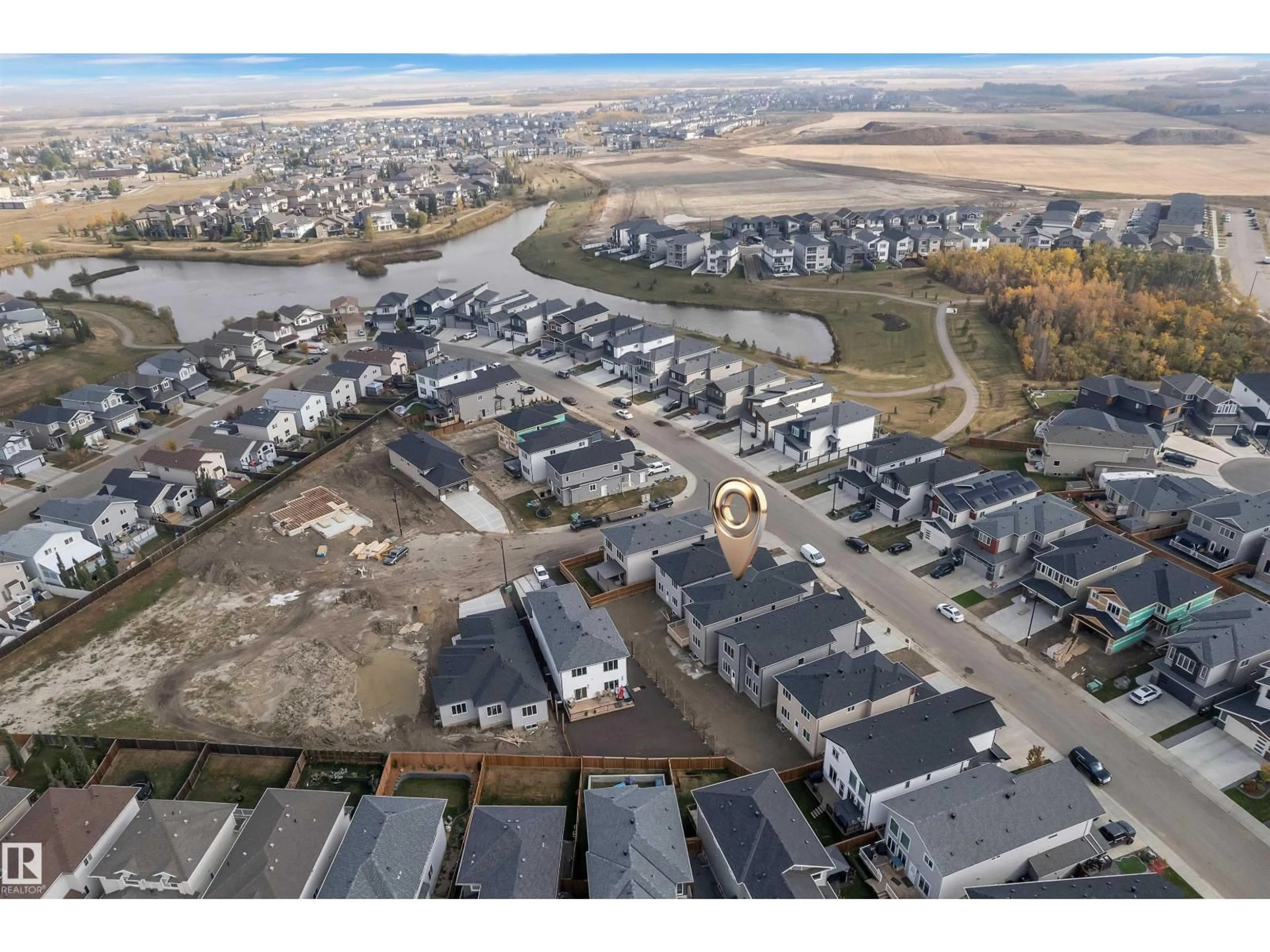 A pic from outside/outdoor area/front of a property/back of a property/a pic from drone, water/lake/river/ocean view for 12 DALQUIST BA, Leduc Alberta T9E1N7
