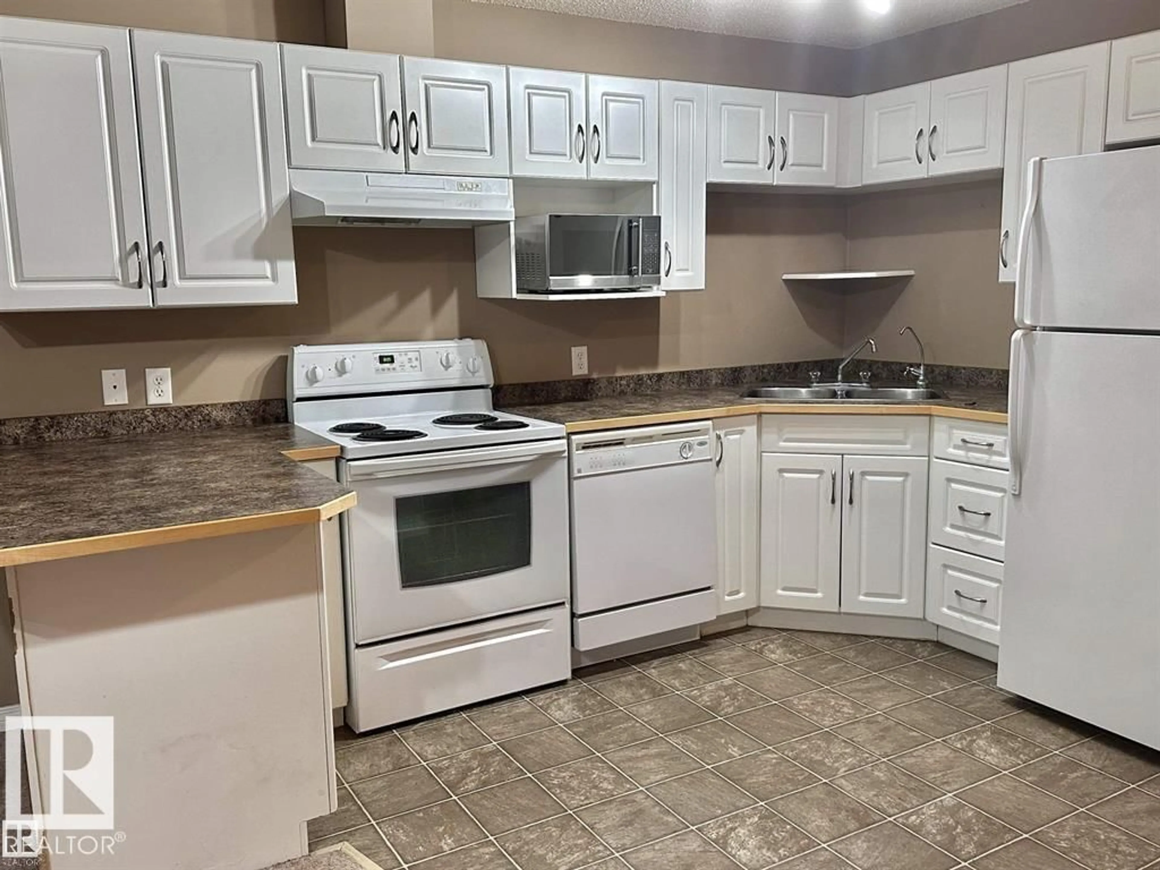 Standard kitchen, unknown for #115 - 3425 19 ST, Edmonton Alberta T6T2B5