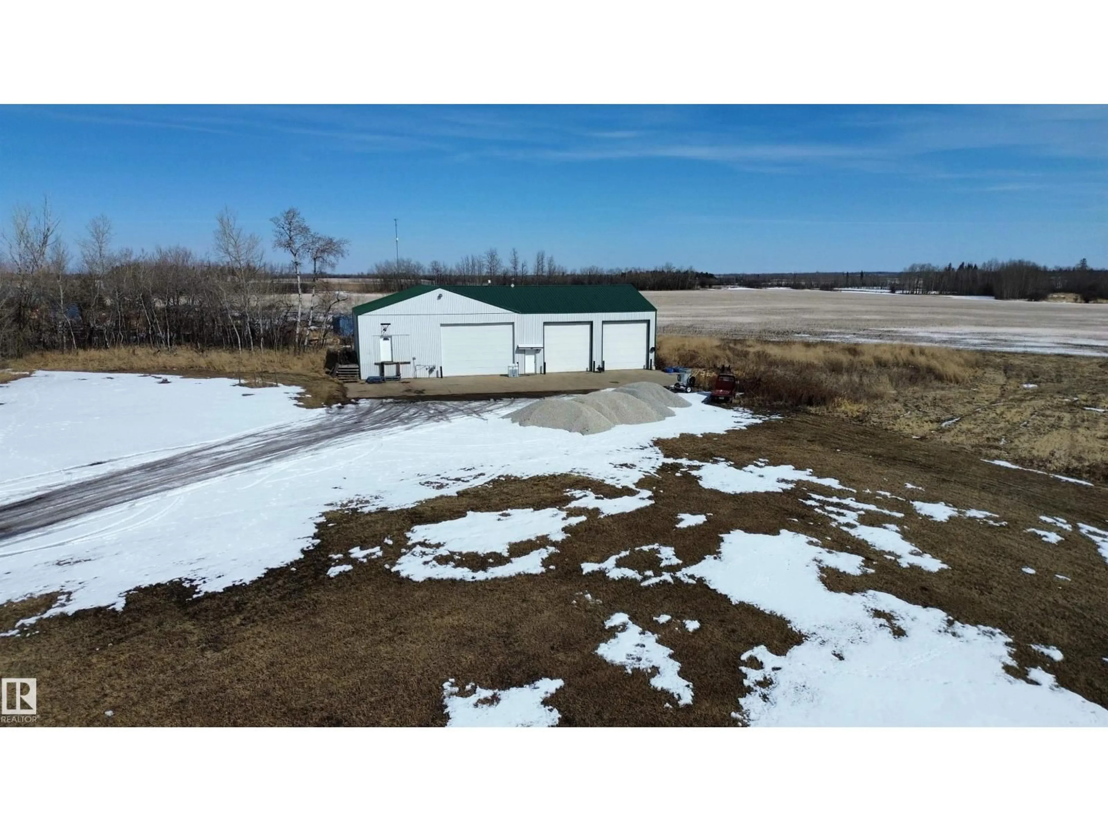 A pic from outside/outdoor area/front of a property/back of a property/a pic from drone, water/lake/river/ocean view for 475031B RGE ROAD 251, Rural Wetaskiwin County Alberta T0C1Z0