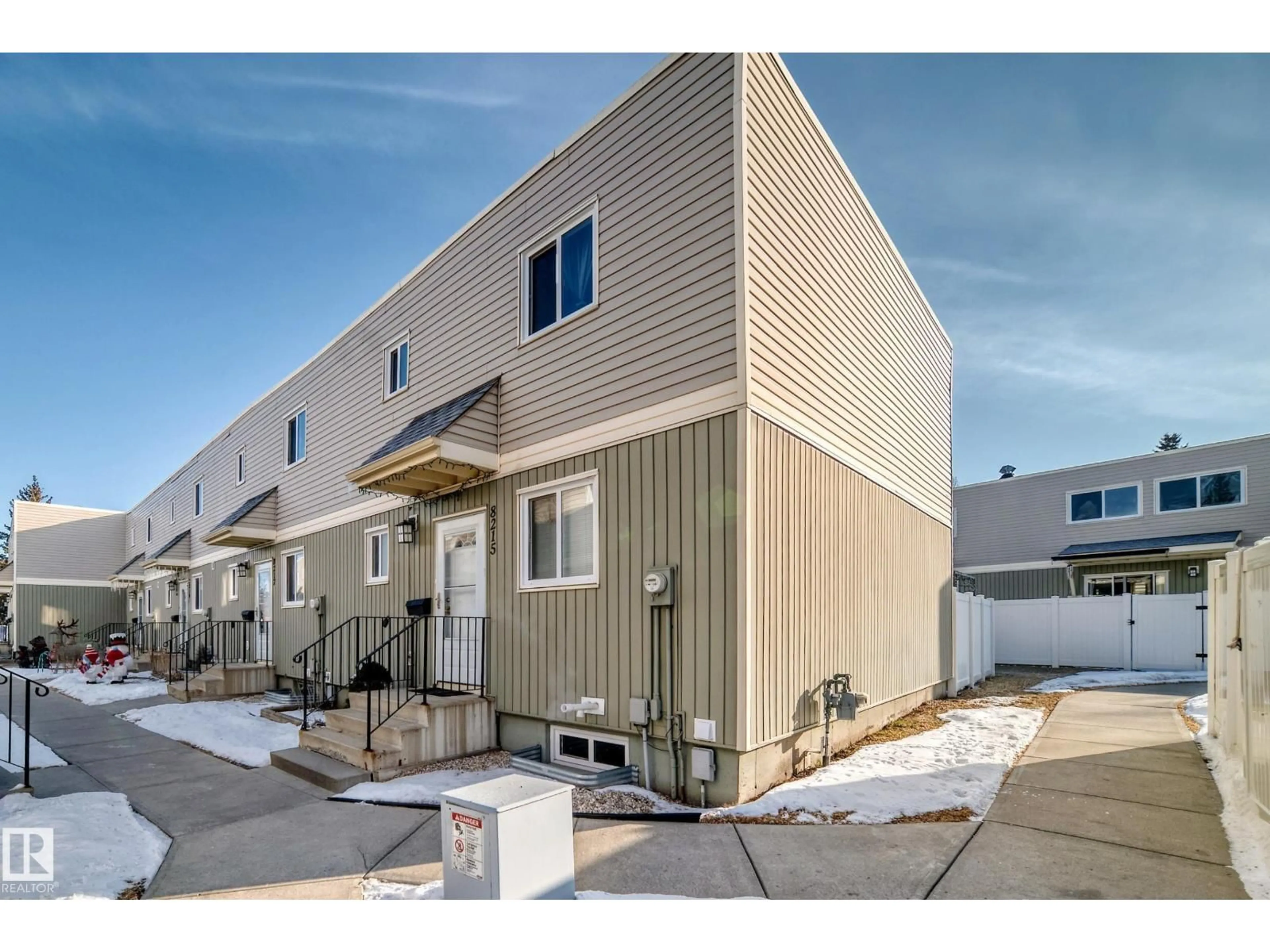 Home with vinyl exterior material, street for NW - 8217 182 ST, Edmonton Alberta T5T1L2