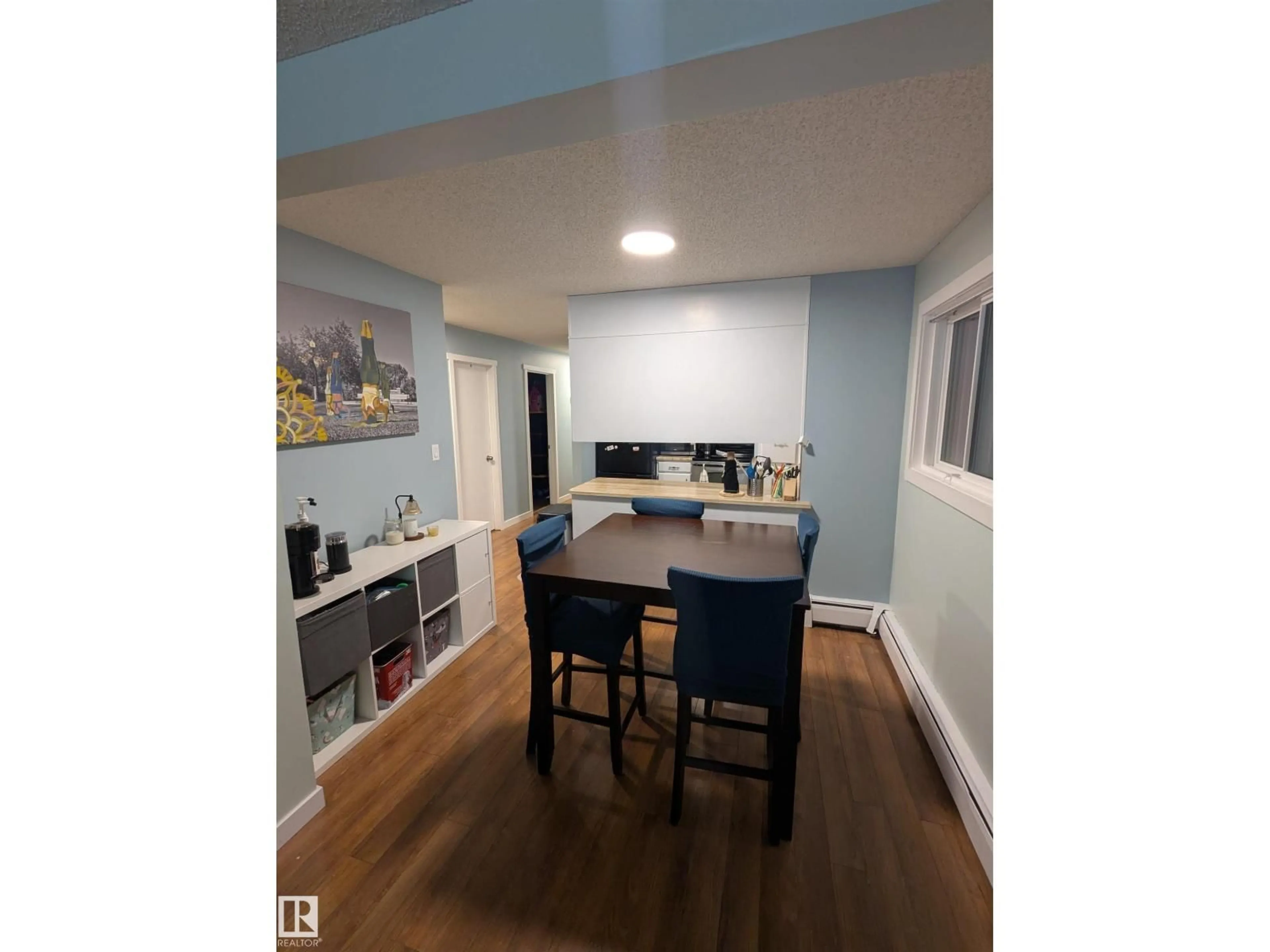 Open concept kitchen, wood/laminate floor for #2 - 9140 149 ST, Edmonton Alberta T5R1C2