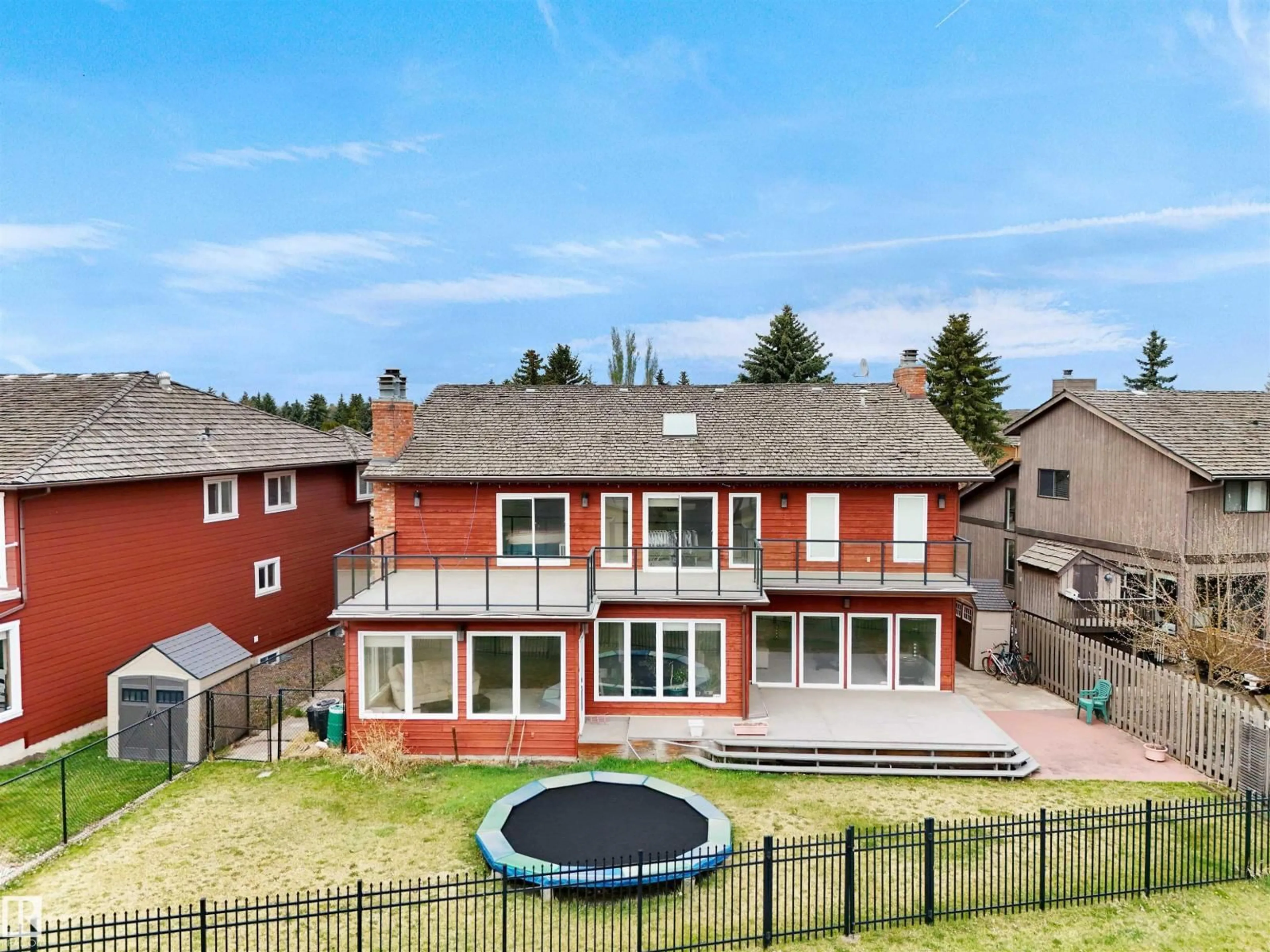 A pic from outside/outdoor area/front of a property/back of a property/a pic from drone, mountain view for NW - 10815 BEARSPAW DR E, Edmonton Alberta T6J5E1