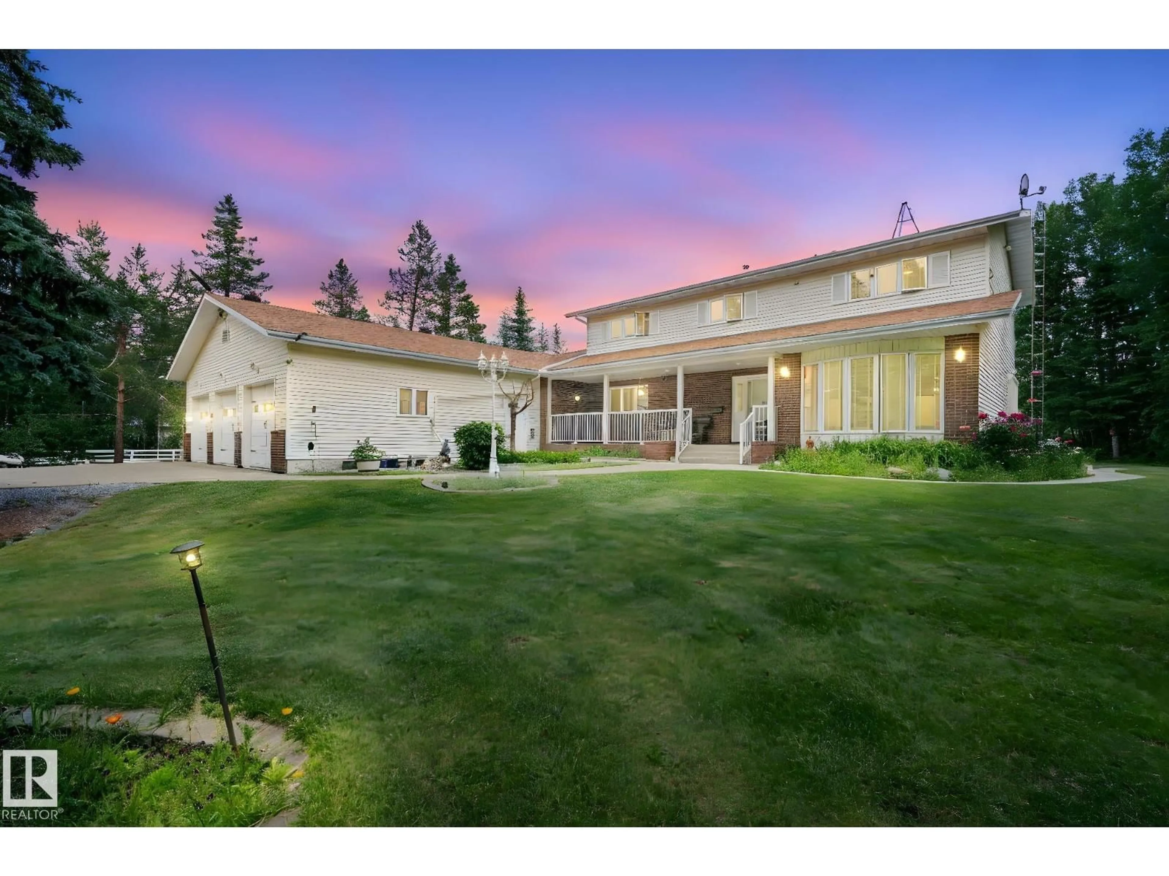 A pic from outside/outdoor area/front of a property/back of a property/a pic from drone, mountain view for 458 23109 TWP ROAD 514, Rural Strathcona County Alberta T8B1K9