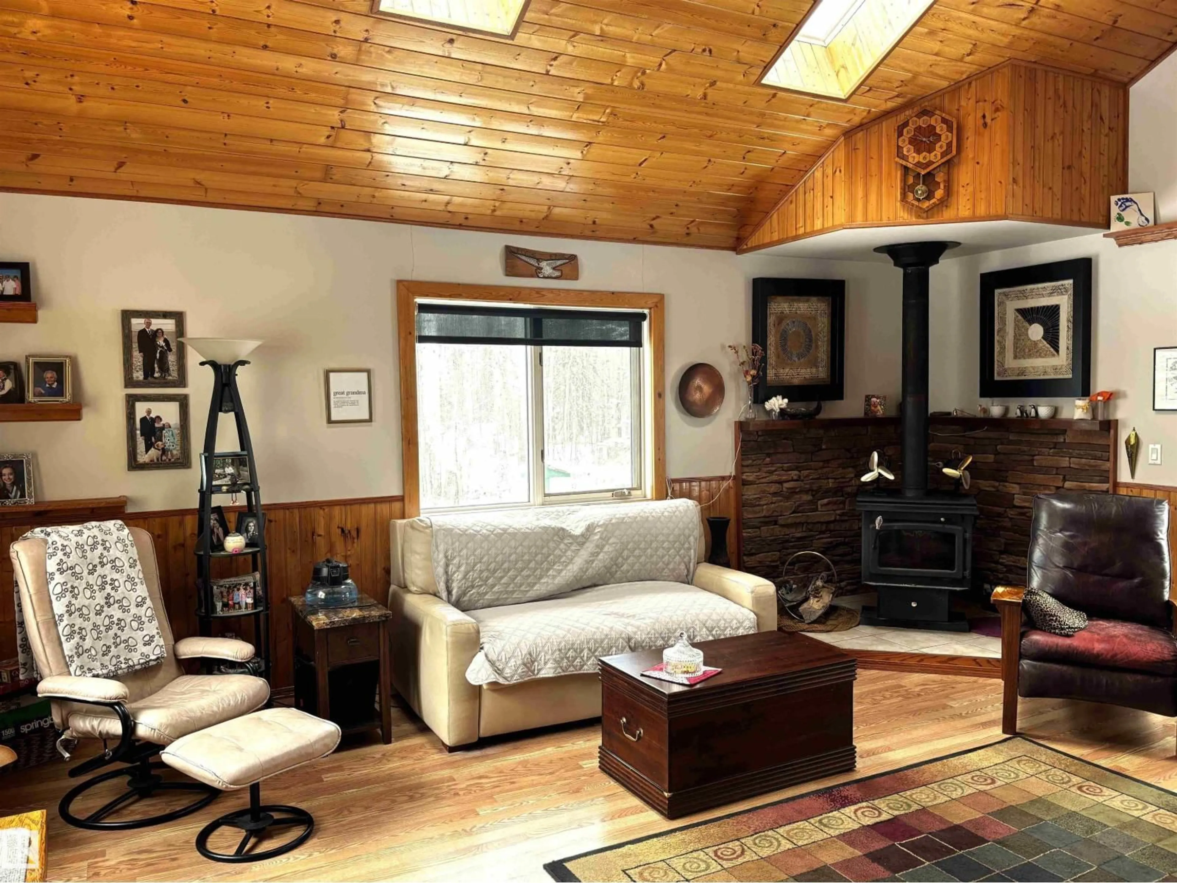 Living room with furniture, wood/laminate floor for 13 - 462073 RGE ROAD 63, Rural Wetaskiwin County Alberta T0C0T0