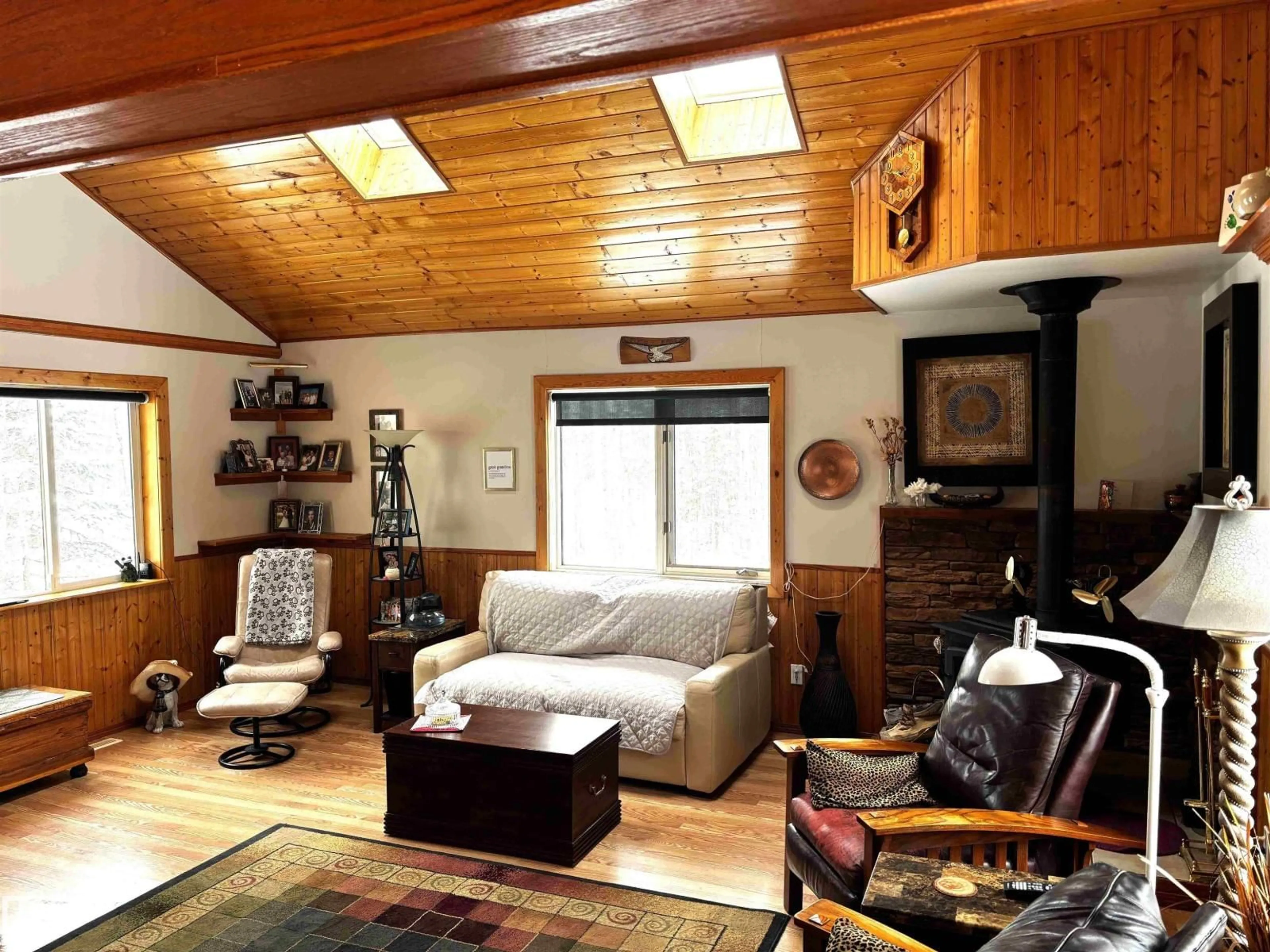 Living room with furniture, wood/laminate floor for 13 - 462073 RGE ROAD 63, Rural Wetaskiwin County Alberta T0C0T0