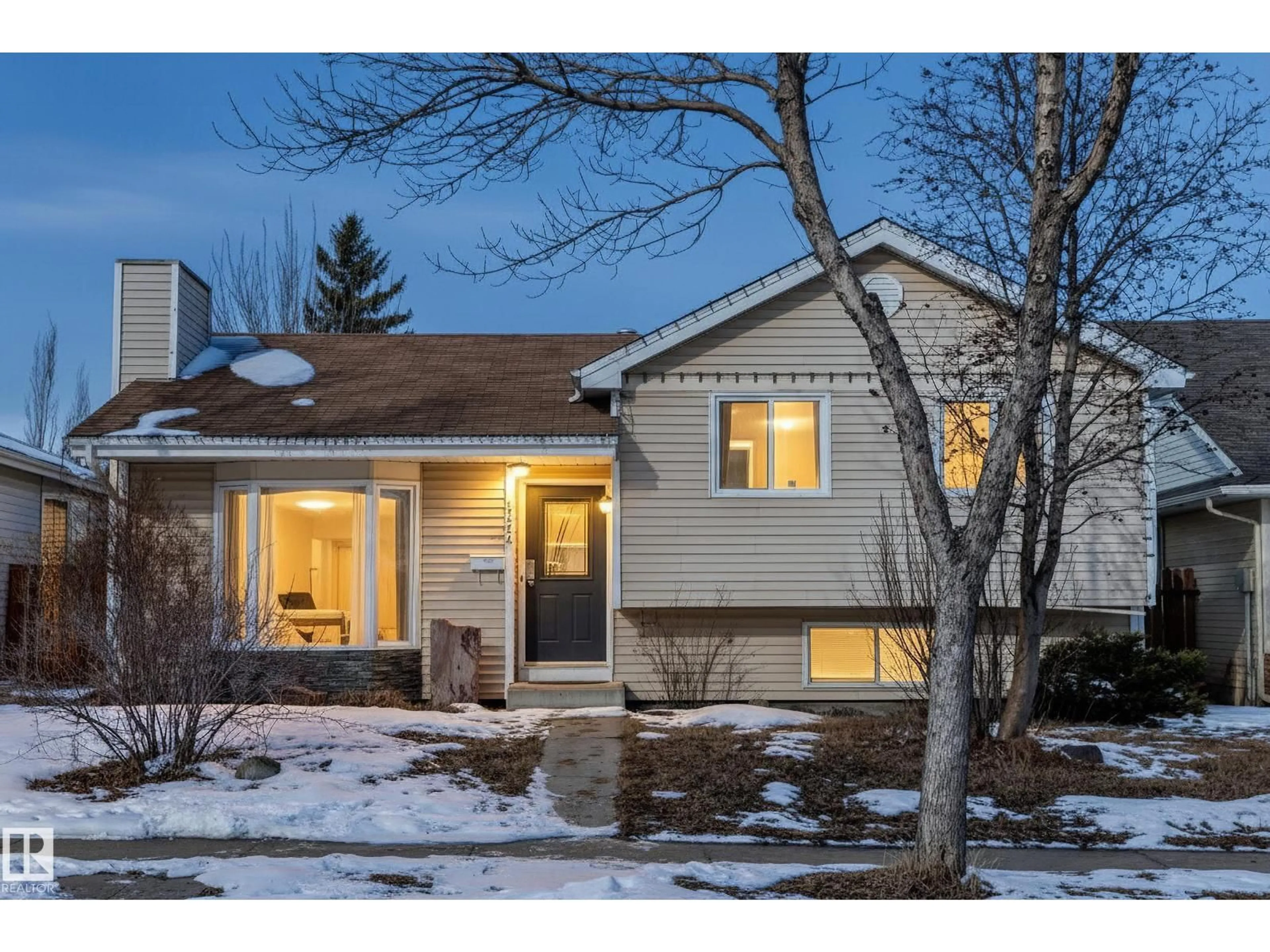 Home with vinyl exterior material, street for 4224 30 ST, Edmonton Alberta T6T1C8