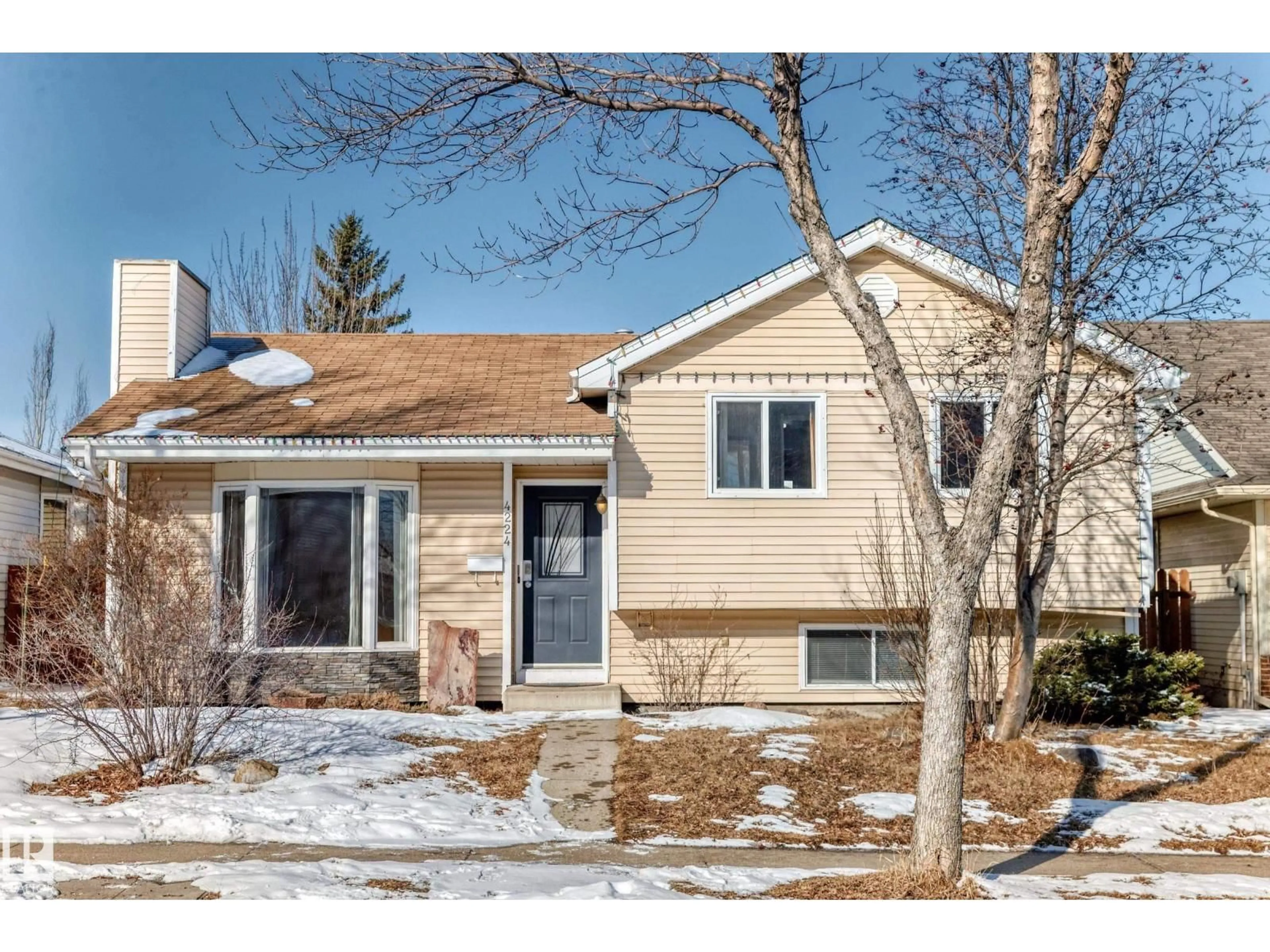Home with vinyl exterior material, street for 4224 30 ST, Edmonton Alberta T6T1C8