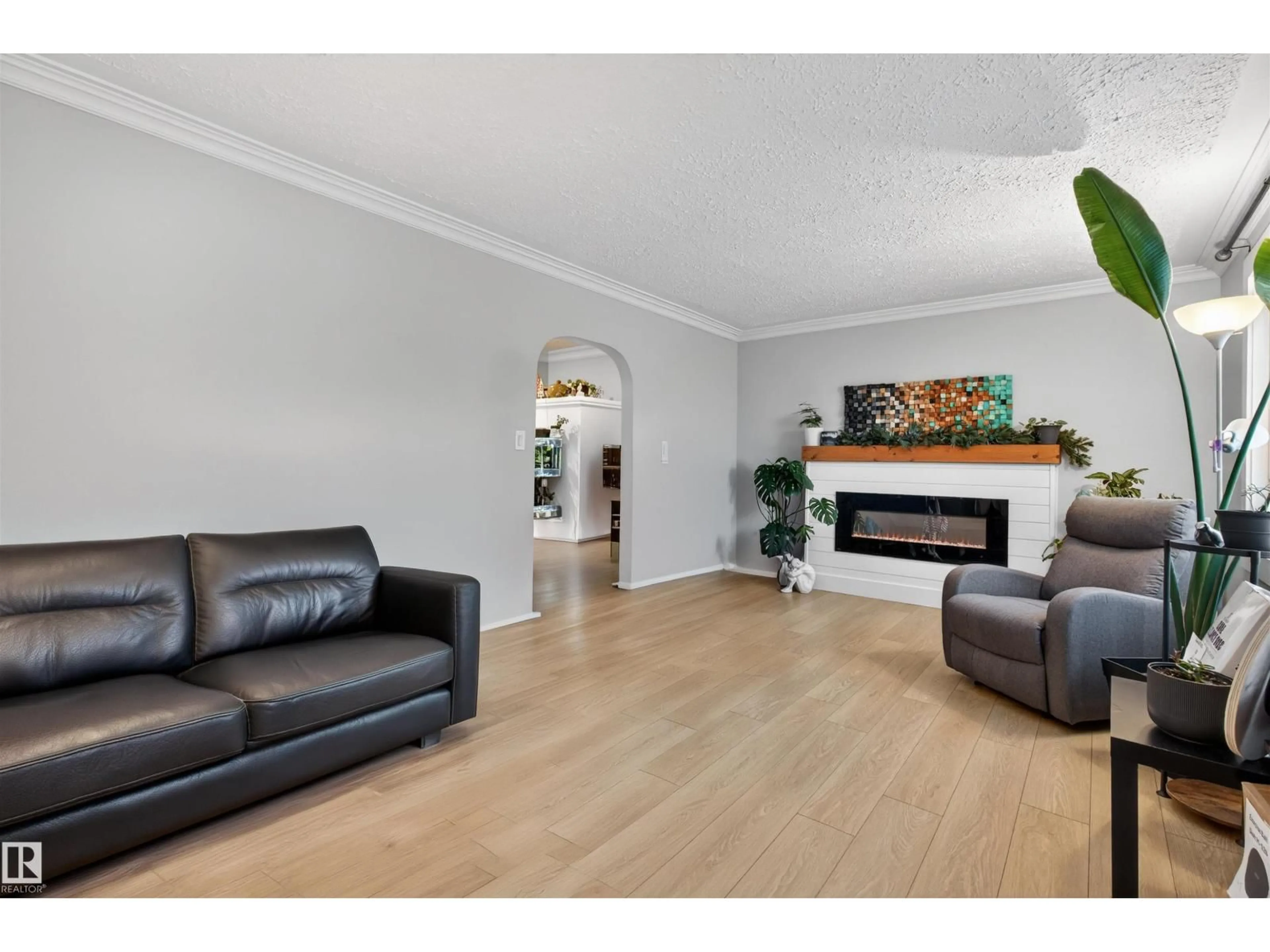 Living room with furniture, wood/laminate floor for 16 MURAL CR, St. Albert Alberta T8N1J9