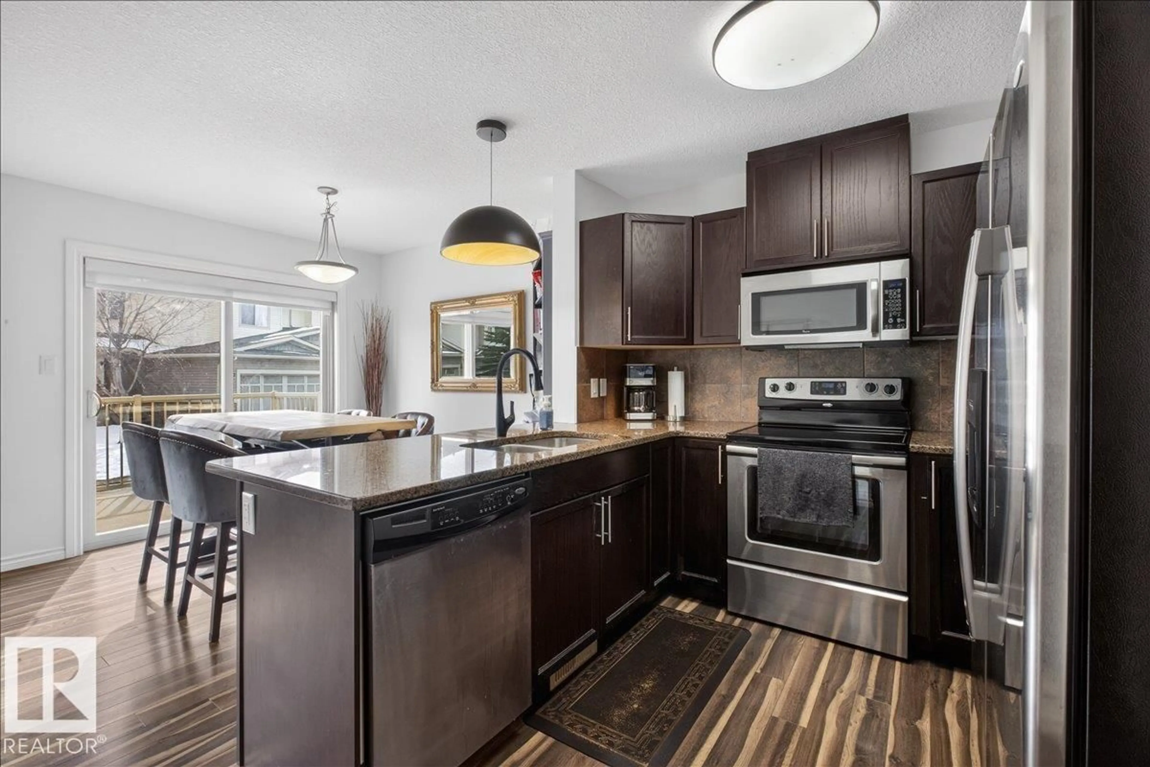 Open concept kitchen, unknown for #123 - 5420 GRANT MACEWAN BV, Leduc Alberta T9E0M1