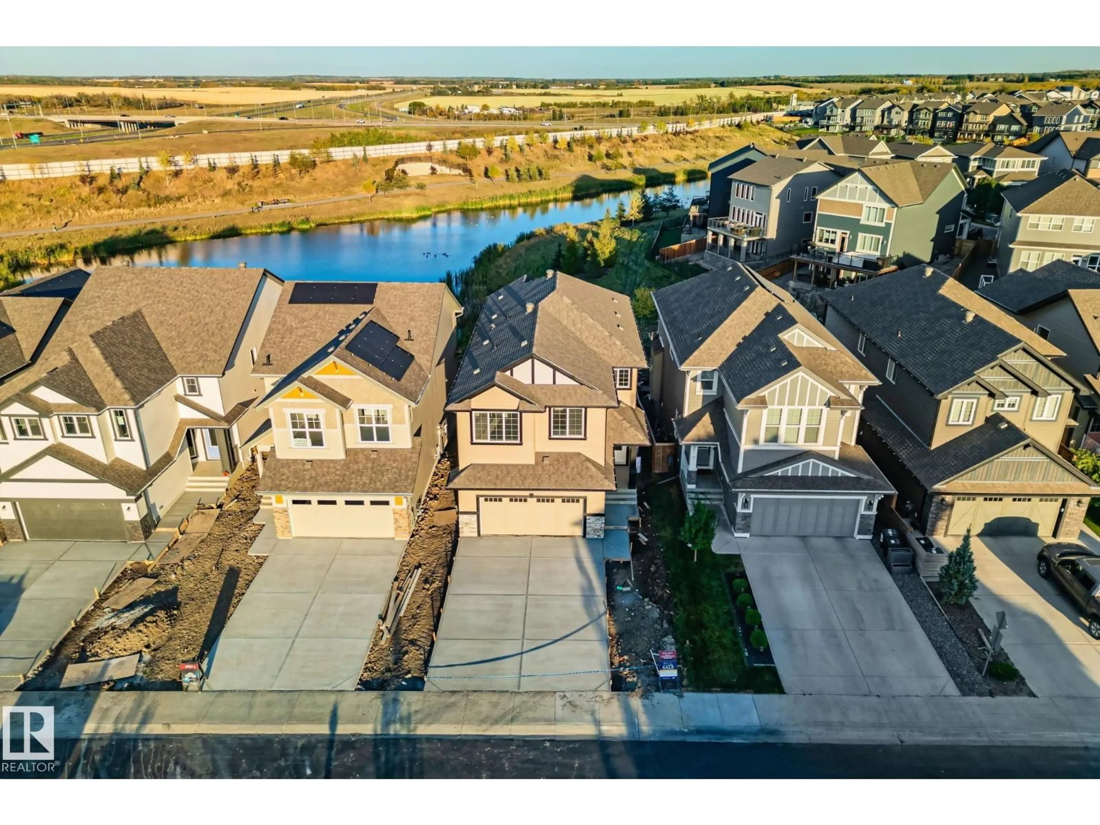 A pic from outside/outdoor area/front of a property/back of a property/a pic from drone, water/lake/river/ocean view for 41 SAVOY CR, Sherwood Park Alberta T8H2Y3