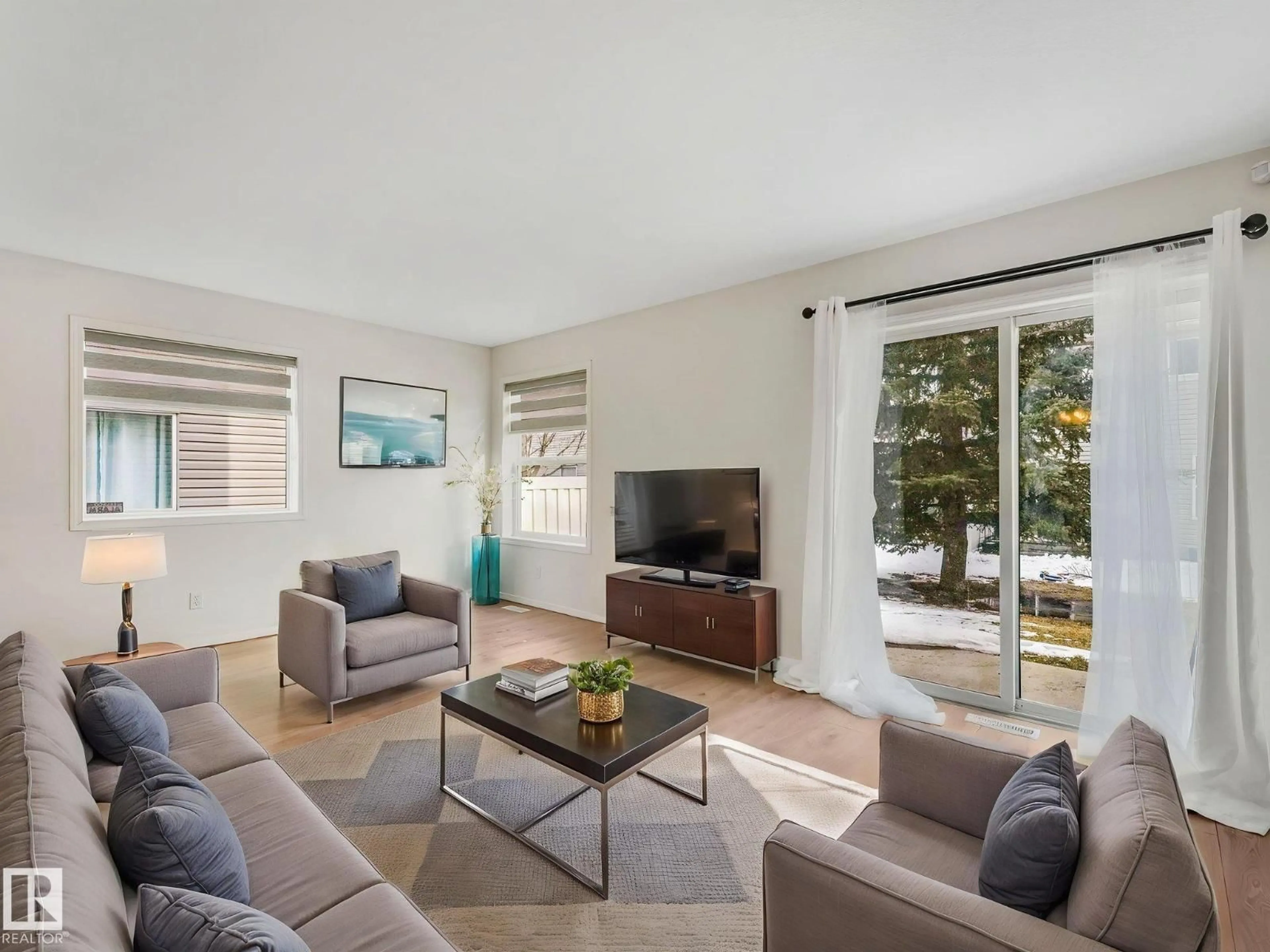 Living room with furniture, unknown for 230 - 117 EDWARDS DR, Edmonton Alberta T6X1G7