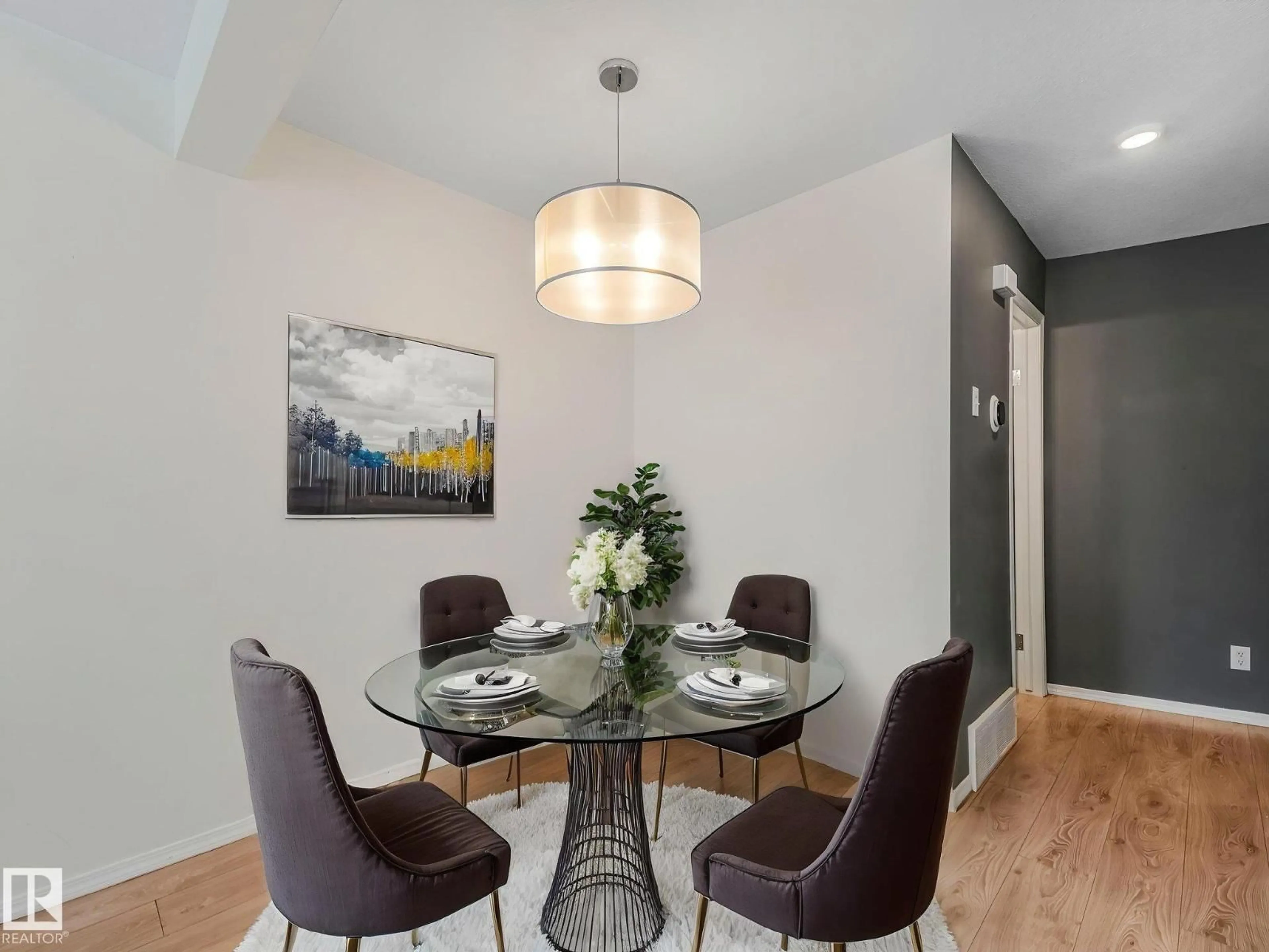 Dining room, wood/laminate floor for 230 - 117 EDWARDS DR, Edmonton Alberta T6X1G7