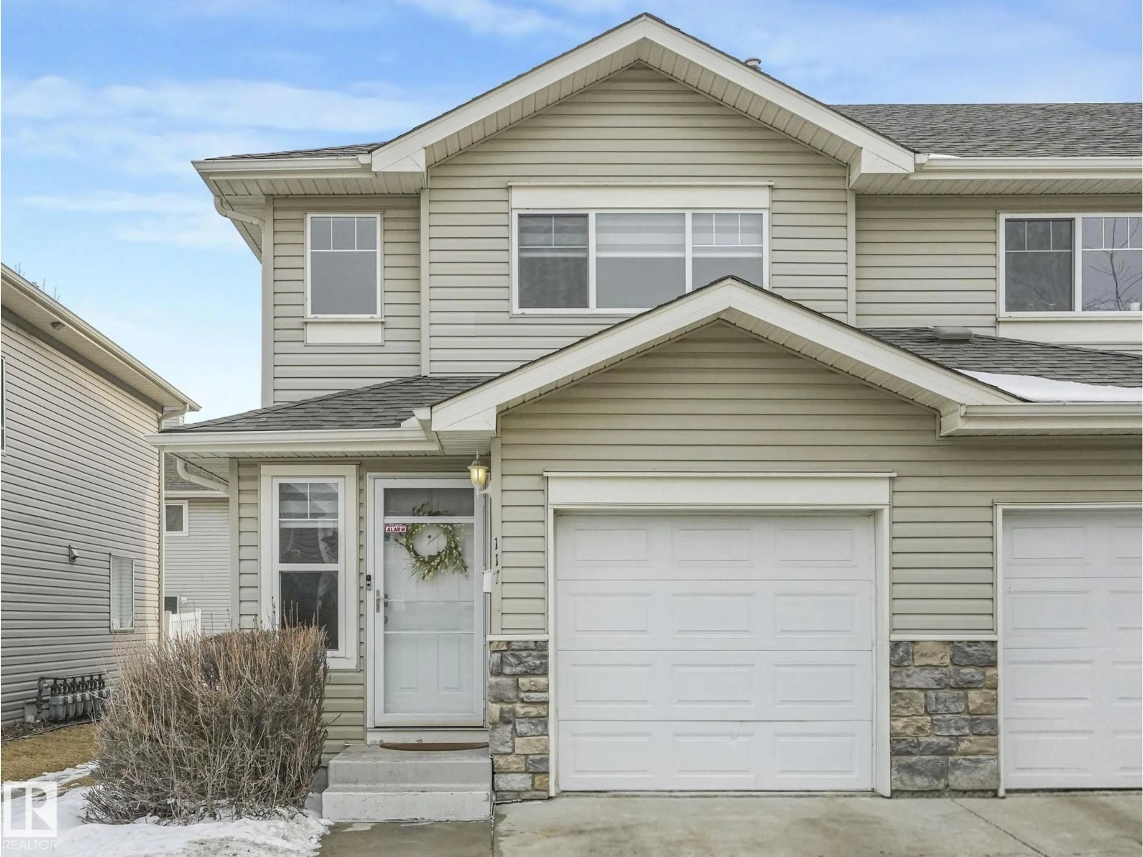 Home with vinyl exterior material, street for 230 - 117 EDWARDS DR, Edmonton Alberta T6X1G7