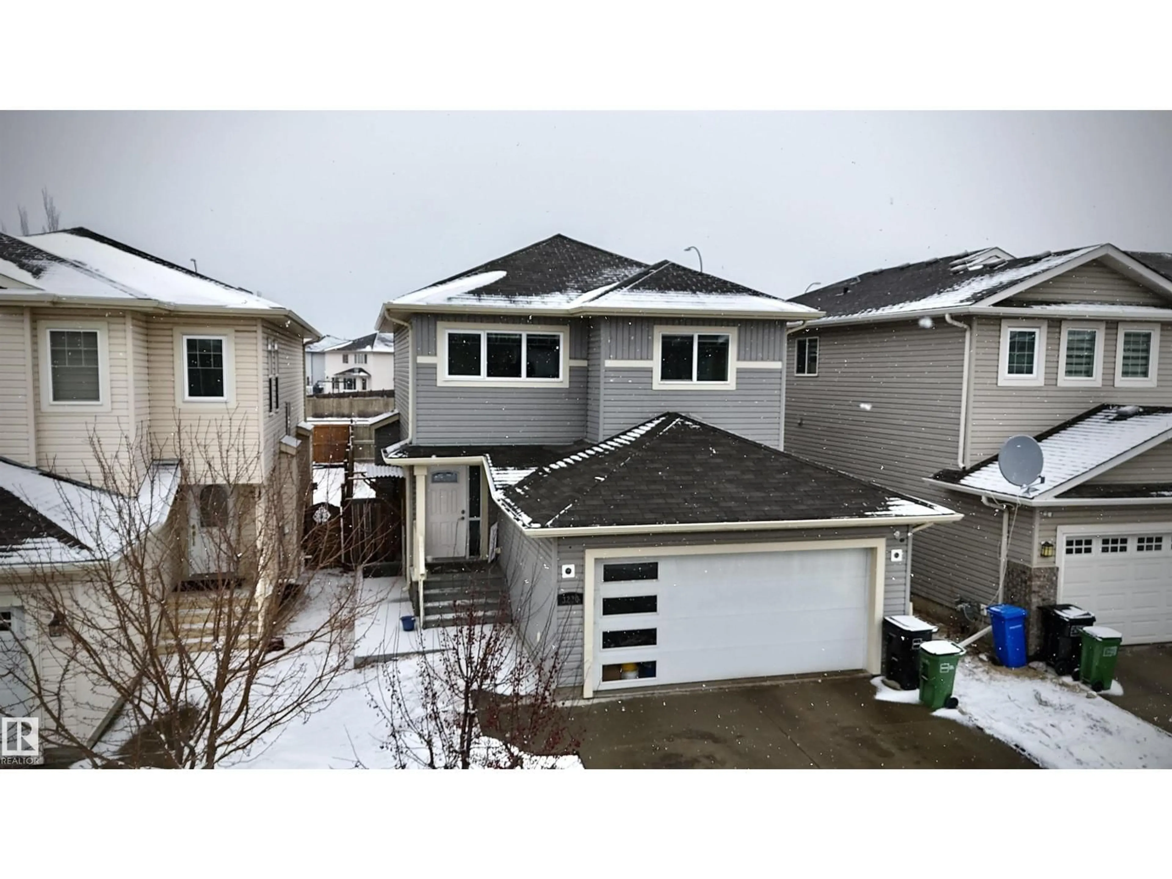 A pic from outside/outdoor area/front of a property/back of a property/a pic from drone, street for 3230 22A AVE NW, Edmonton Alberta T6T0K6
